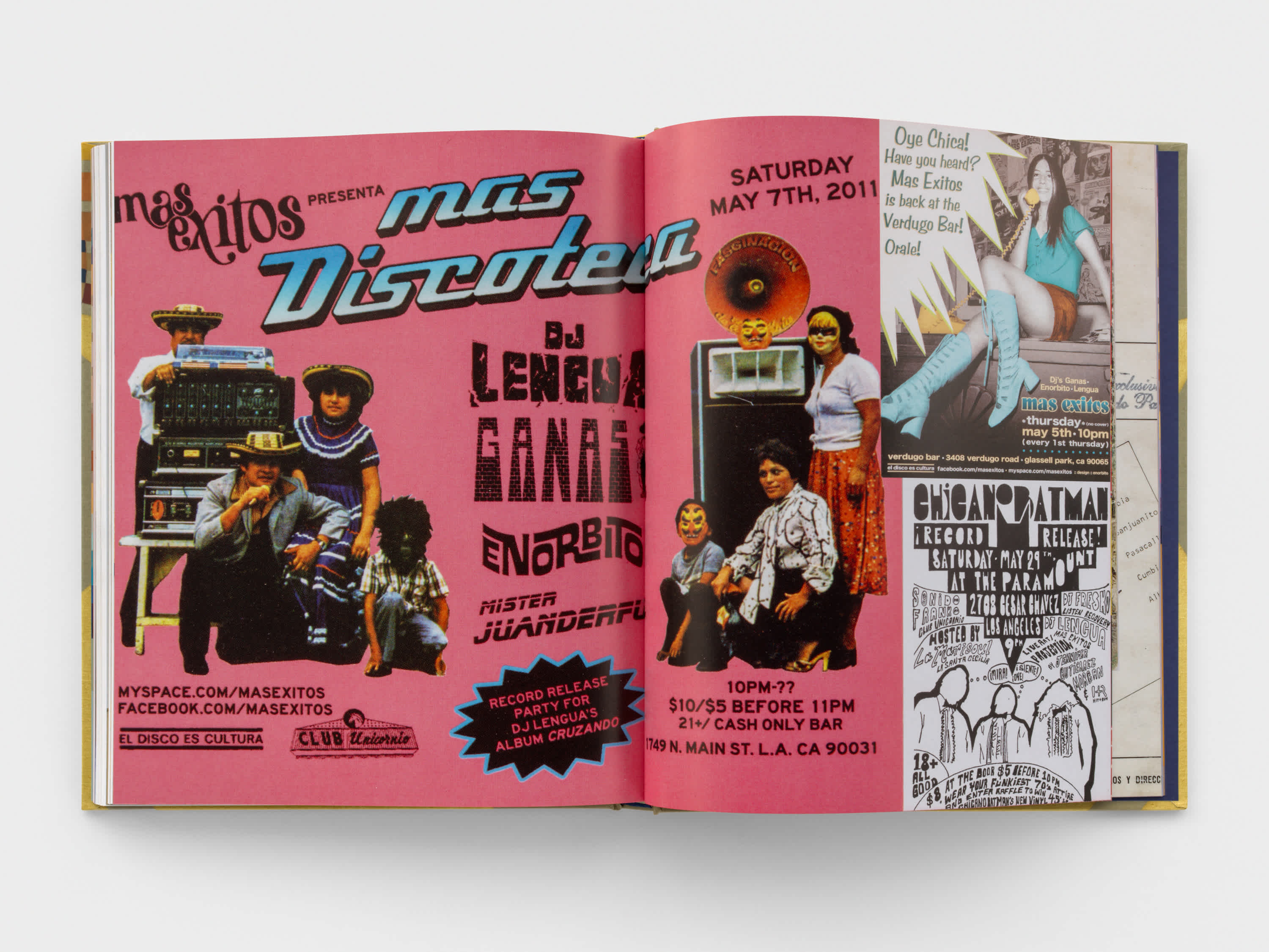 Open book with vintage advertisements collaged across both pages.