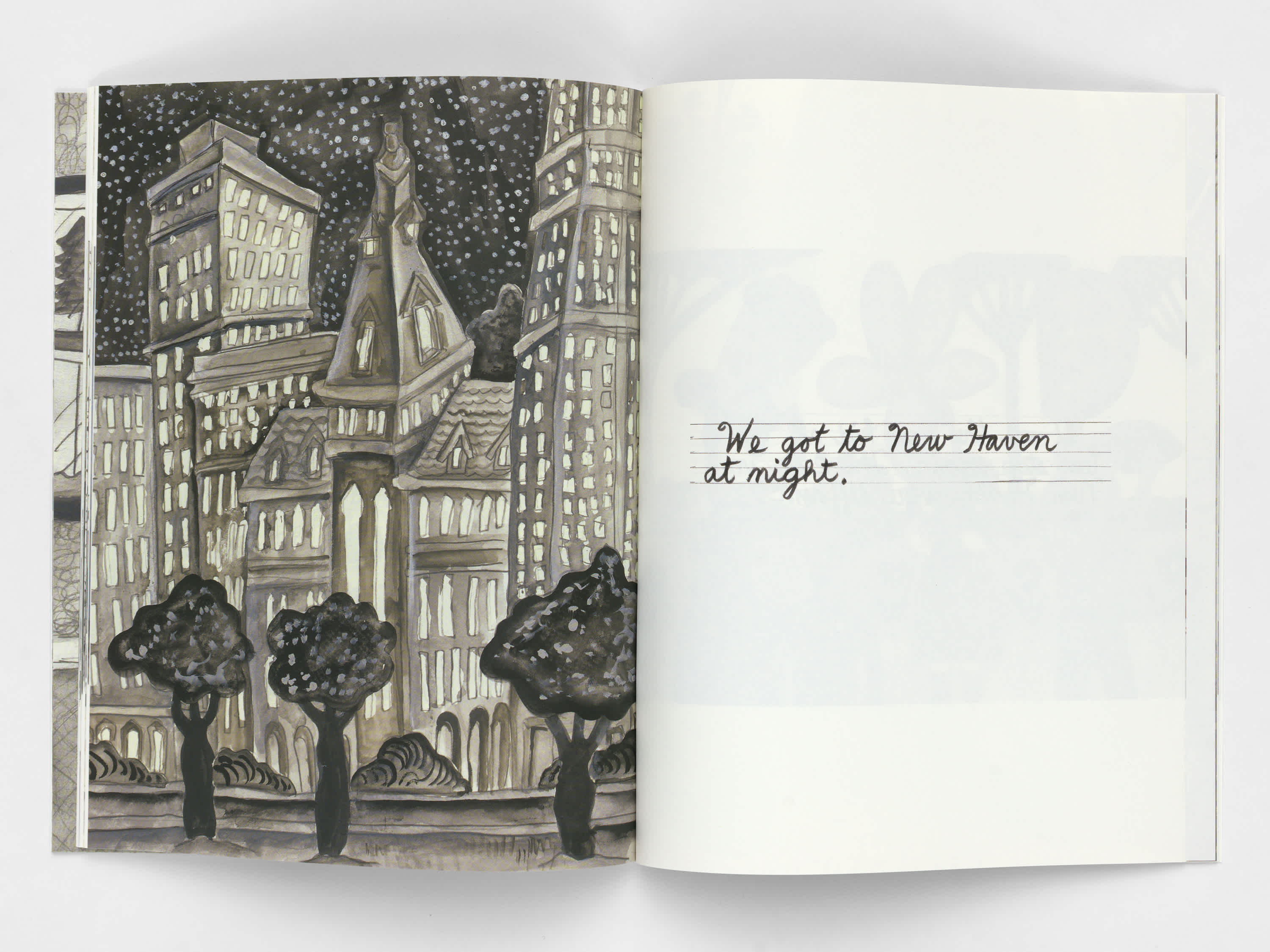 Open book with an ink drawing of a town on the left page, and two lines of handwritten script on the right page.