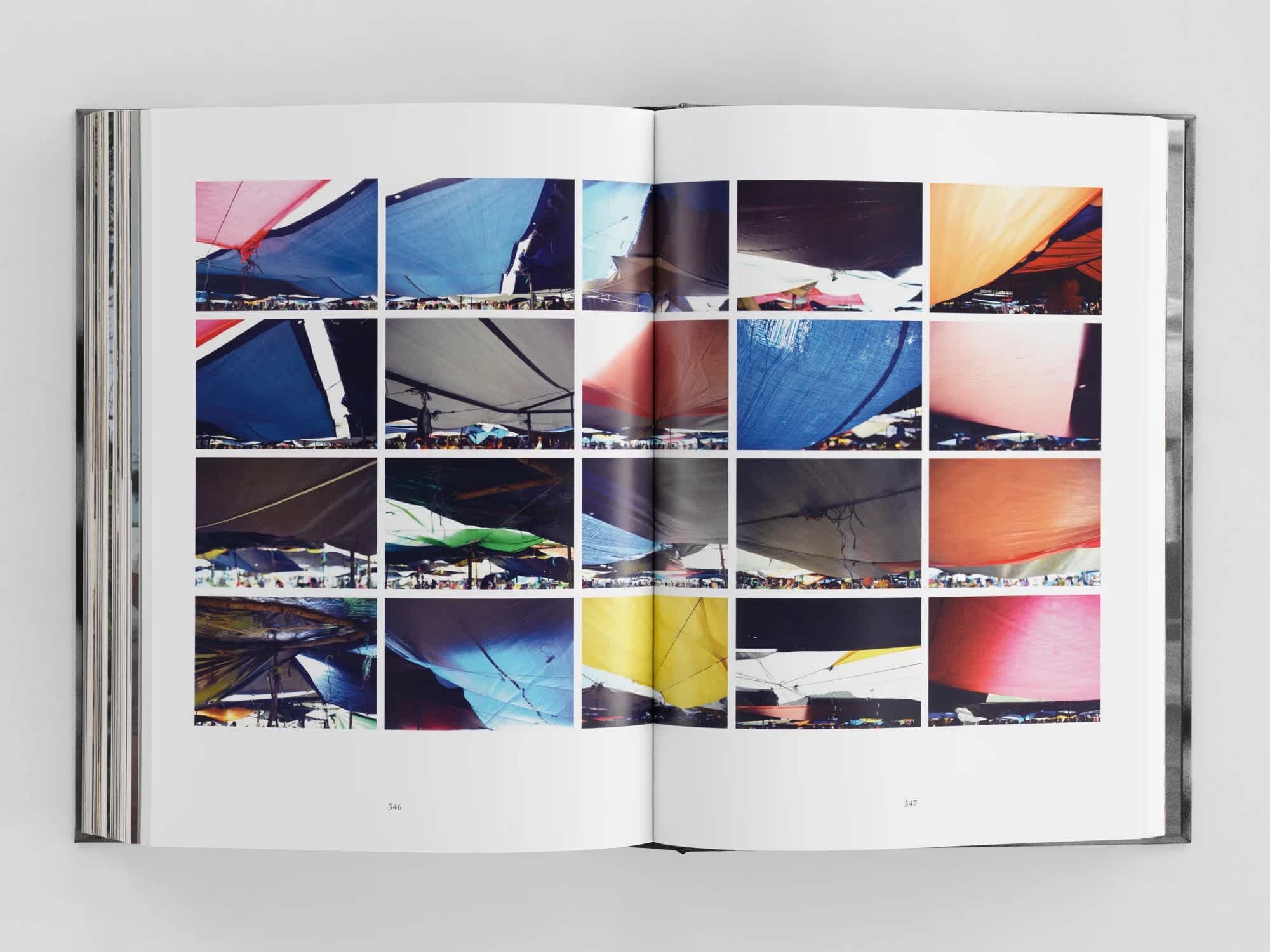 Five by four grid of photos of different colored make-shift tents.