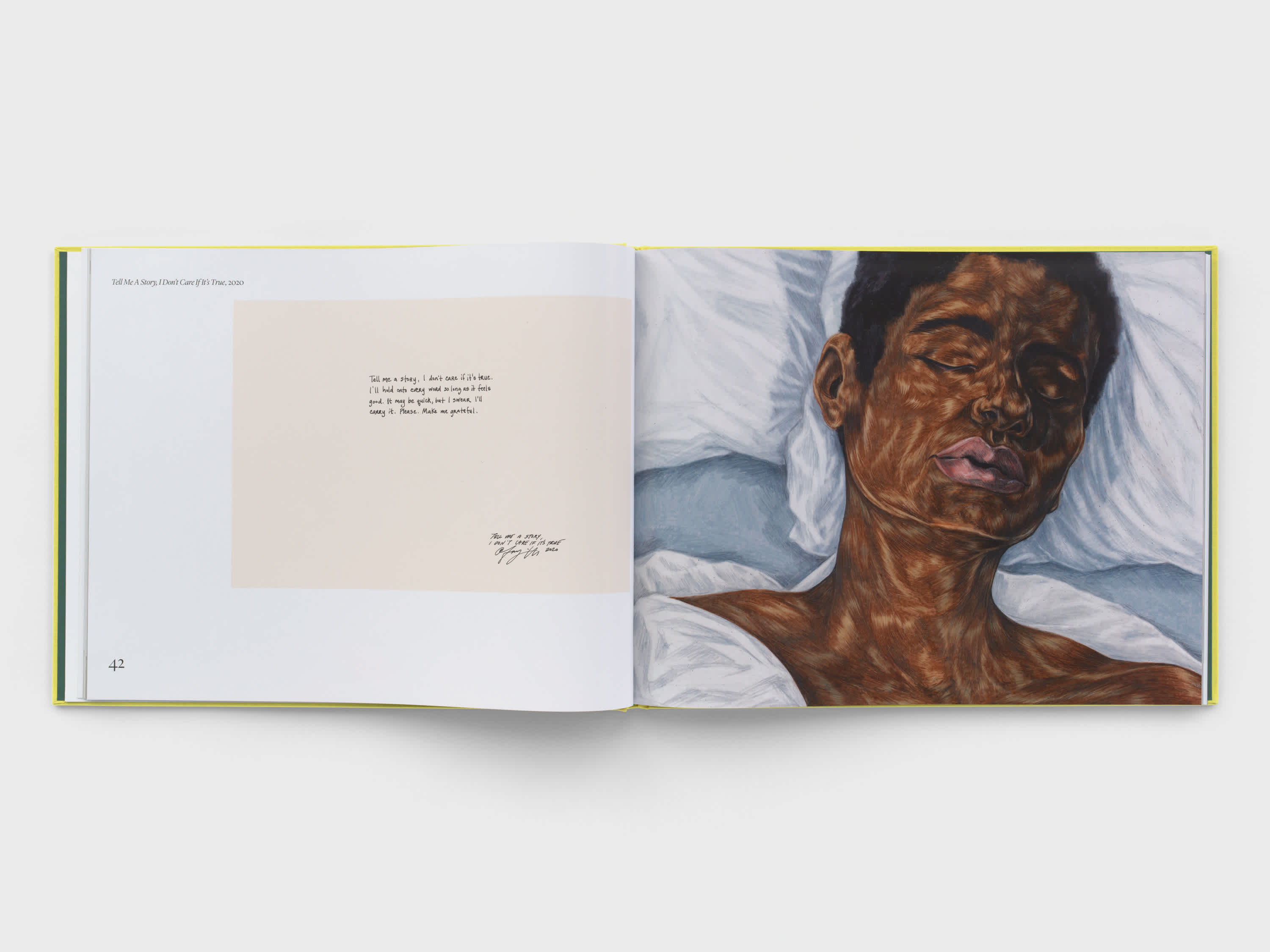 An open book shows two pages. The right page has a full bleed drawing of a woman, seen from the shoulders up, sleeping. Her head is resting on a pillow. The left page shows a note written on blush pink card stock, off-center and to the right.