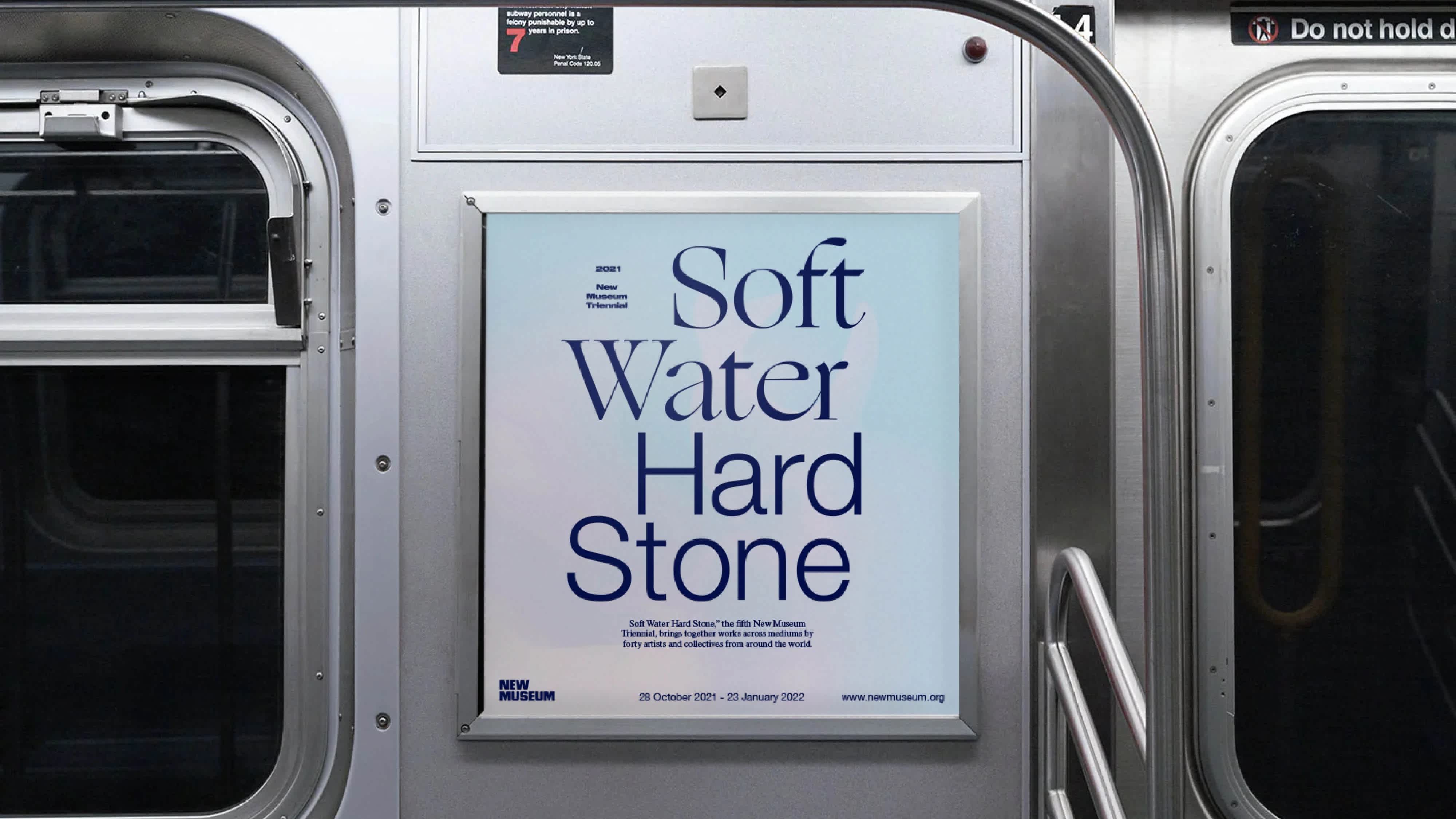 Interior subway ad that features dark blue text over a light pink and light blue cotton candy background.