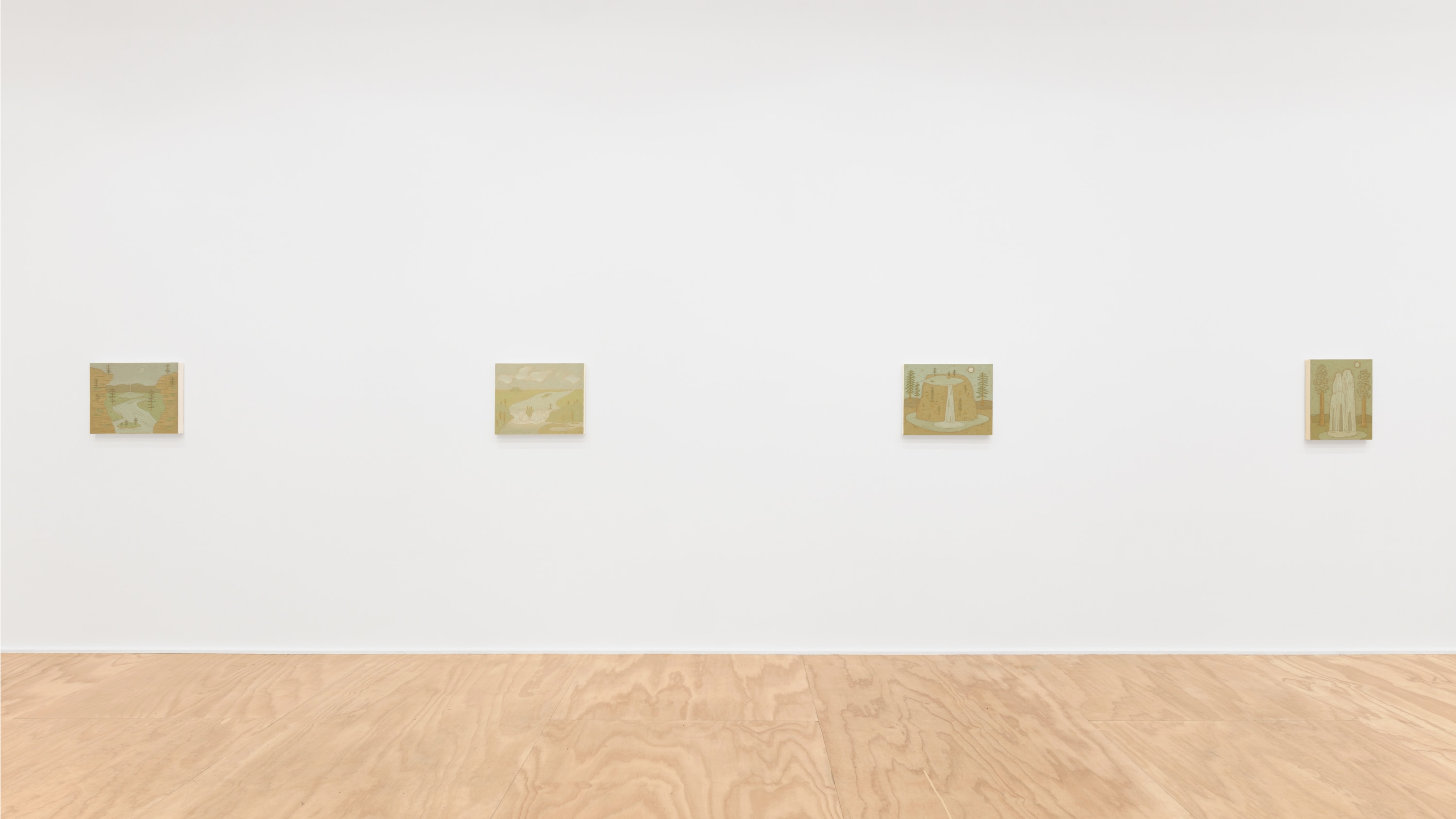 Exhibition shot of four paintings hanging on a white wall. The floor in front of the wall is wooden.