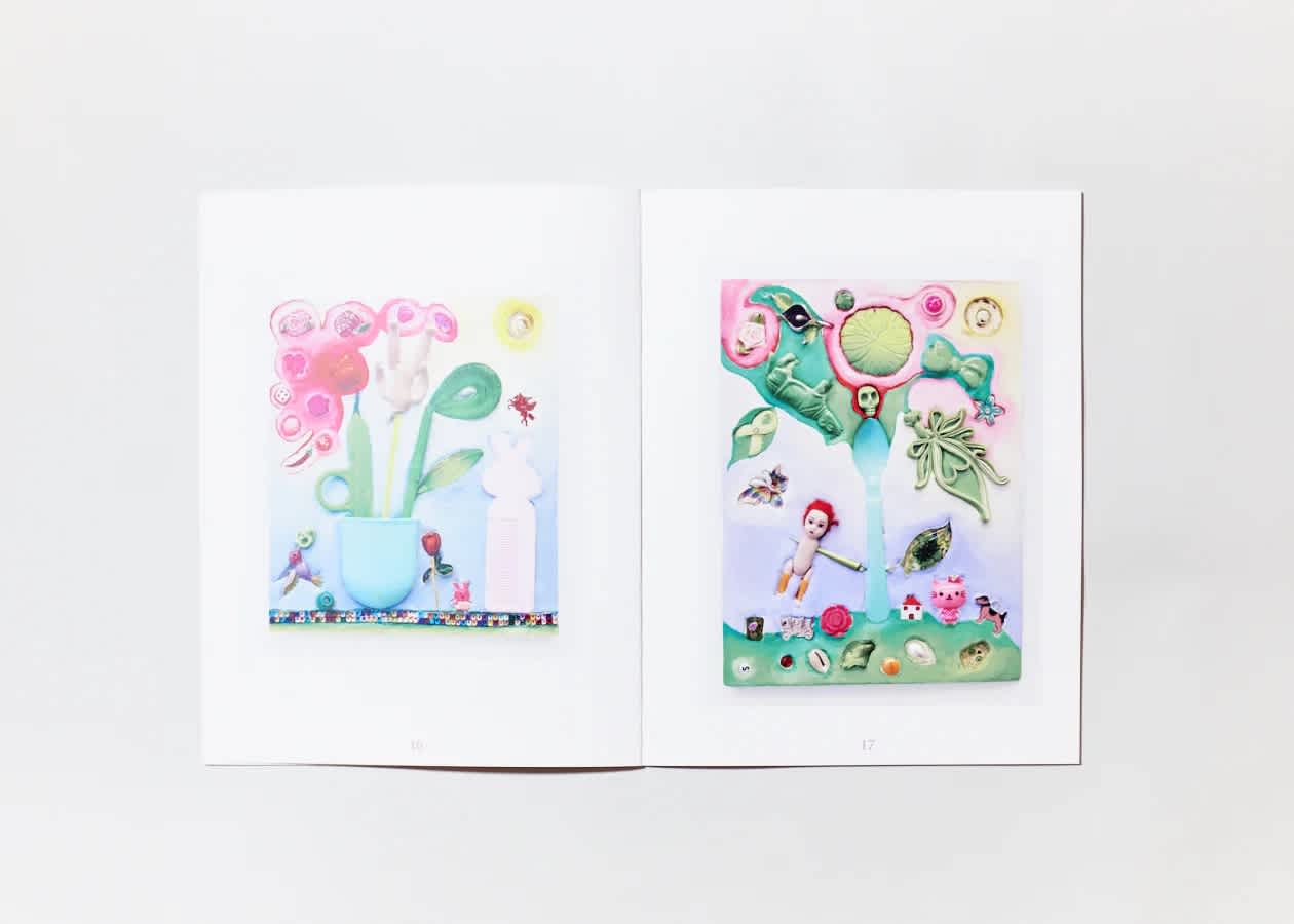 Open book with a different artwork on each page. Both artworks are light pinks, greens, blues, and yellows.