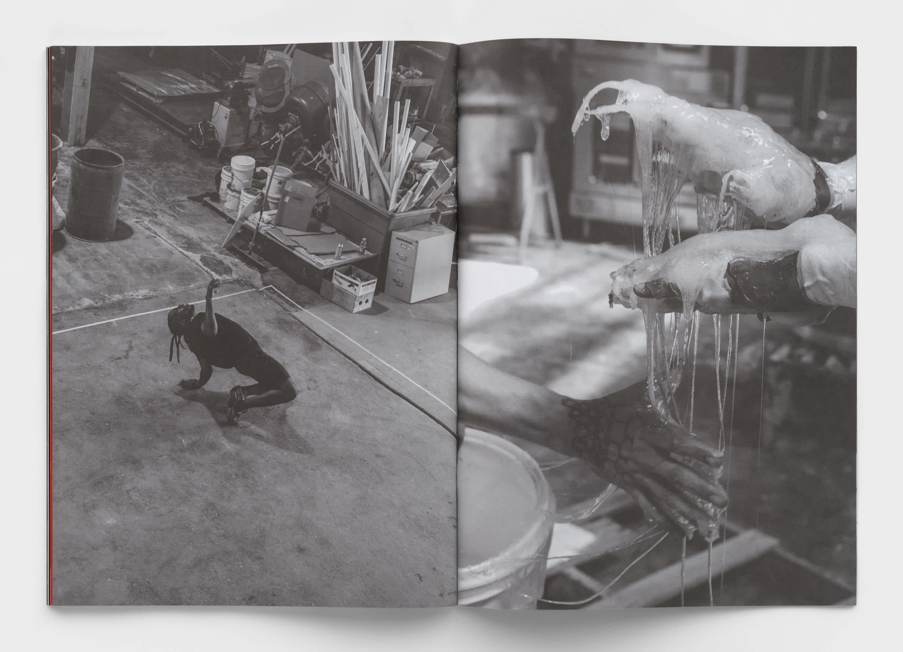 Two page black and white spread of the book 'Secondary' created for Matthew Barney's exhibition of the same name. The left page is a rehearsal image of a performer dancing in the warehouse space. The right image is a close-up of hands working with resin.