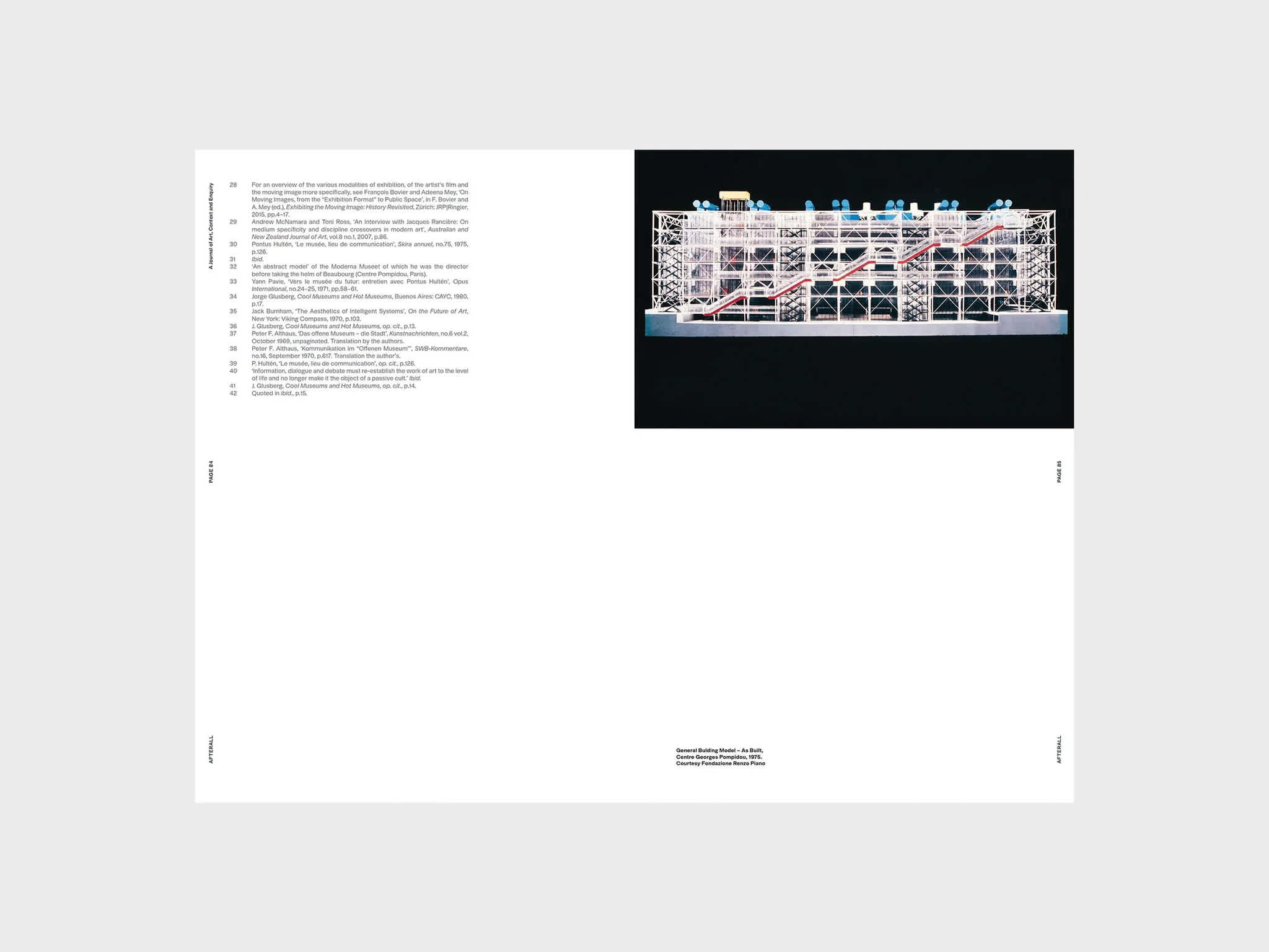 Magazine interior with text on the top left corner of the left page. An image sits in the top third of the right page.