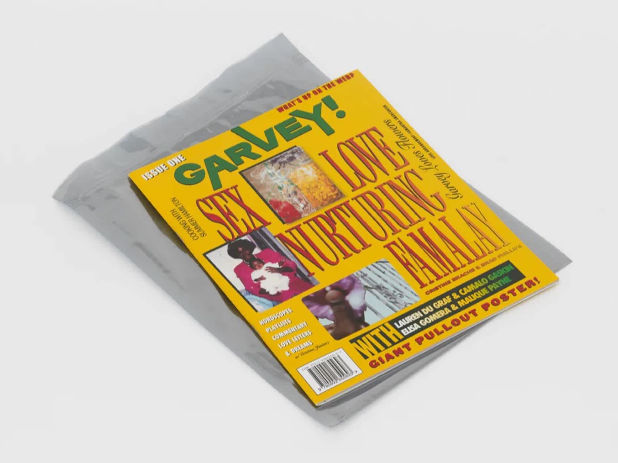 Bright yellow book on top of a plastic film. The text on the cover is red and green and laid-out like a tabloid magazine.