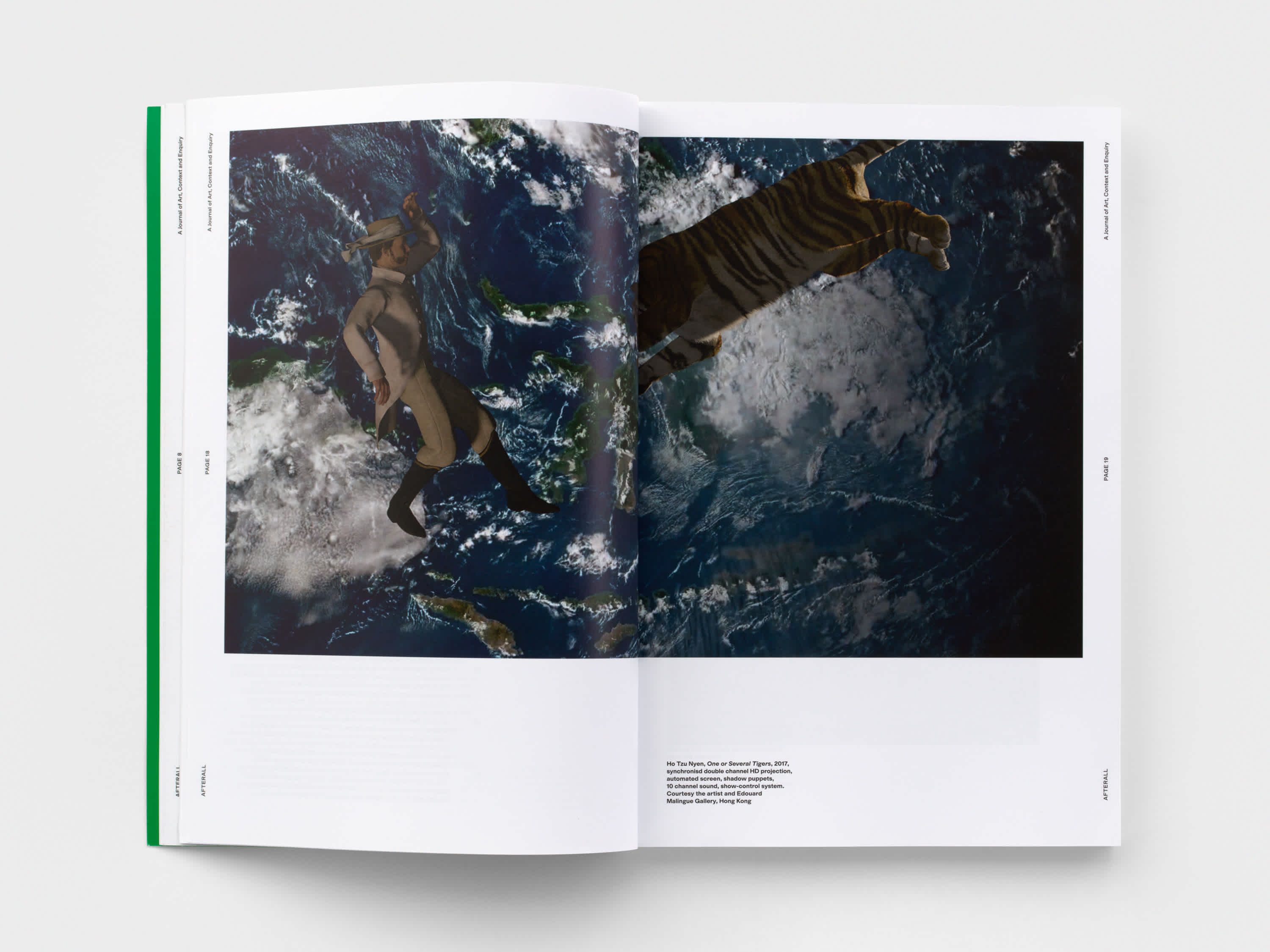 Open magazine with a photograph of the earth from space. There is a tiger and man photoshopped into the image. A white border runs around the image.