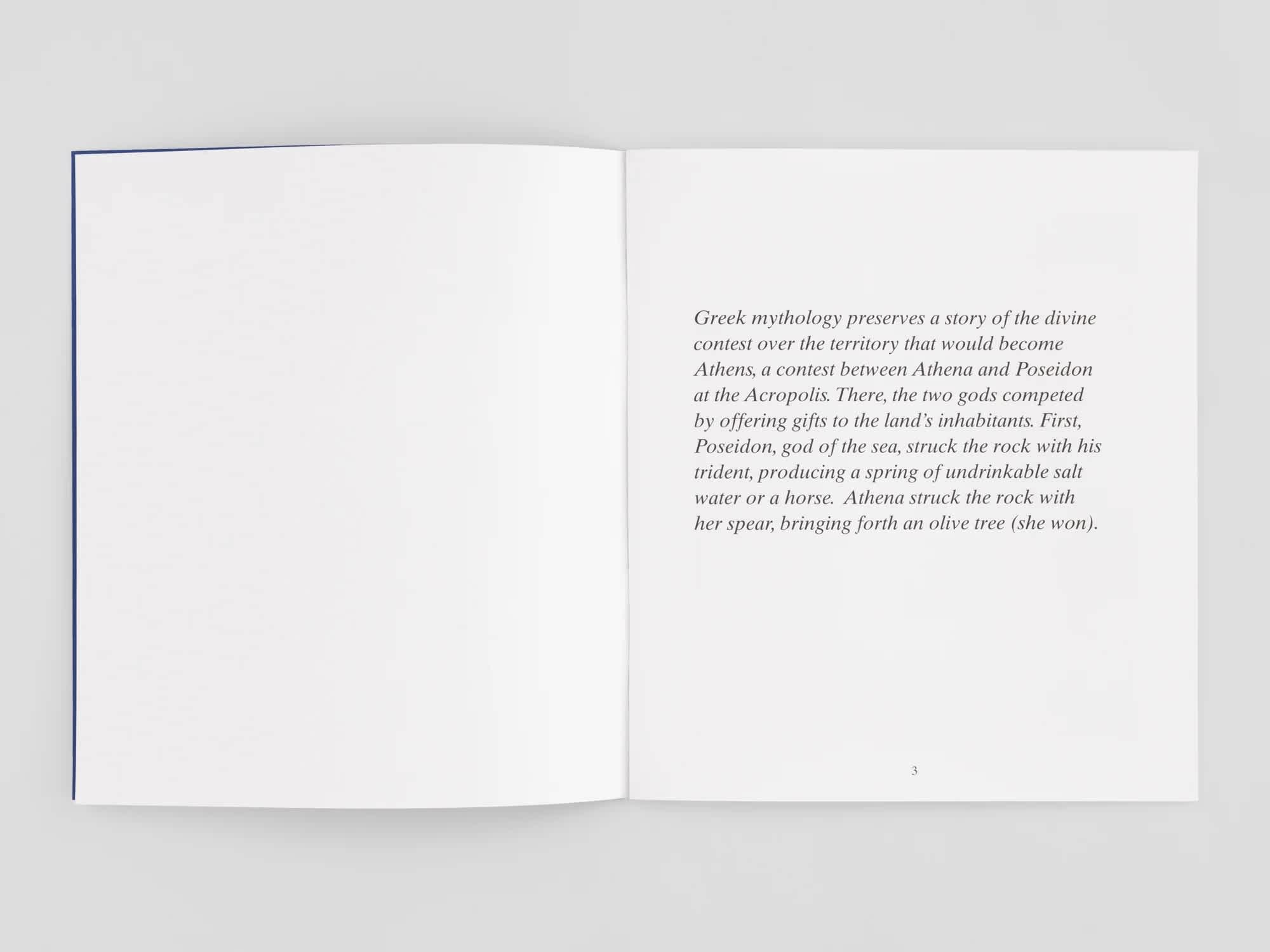 An open book with two white pages. The right page has a short block on black text on it.