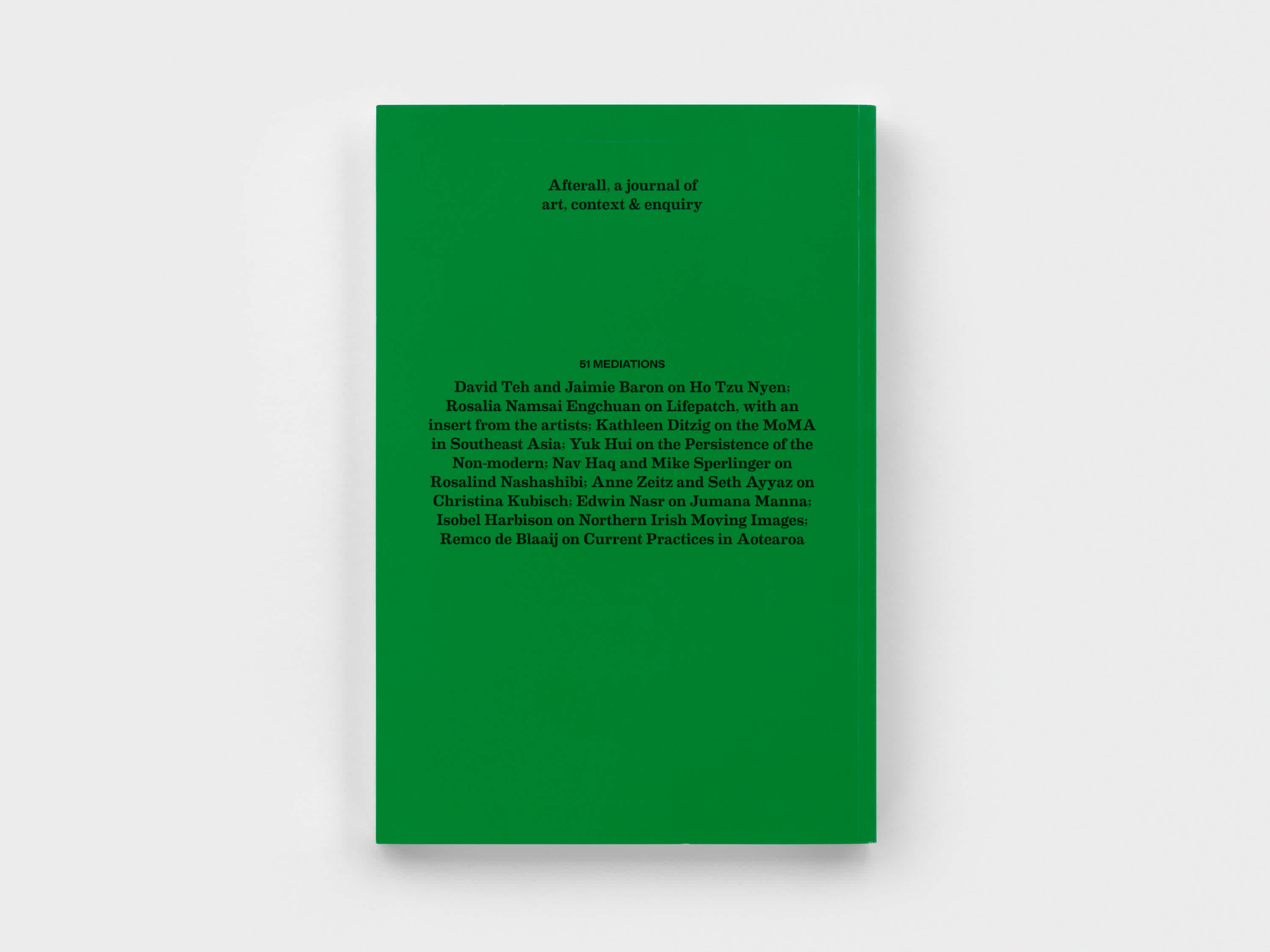 Back cover of a green magazine. Black text is aligned in the center of the cover. A barcode is in the right bottom corner.