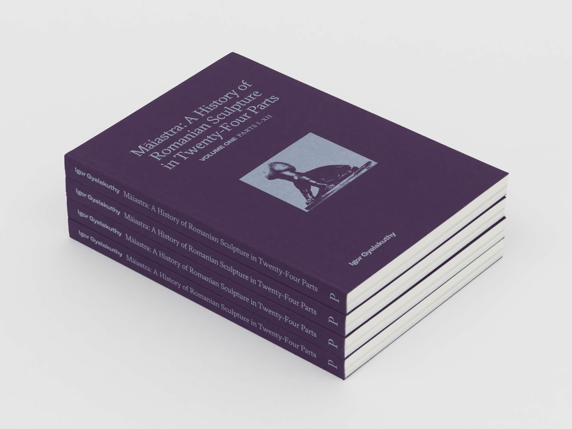 Four purple books in a stack. The spines are visible.