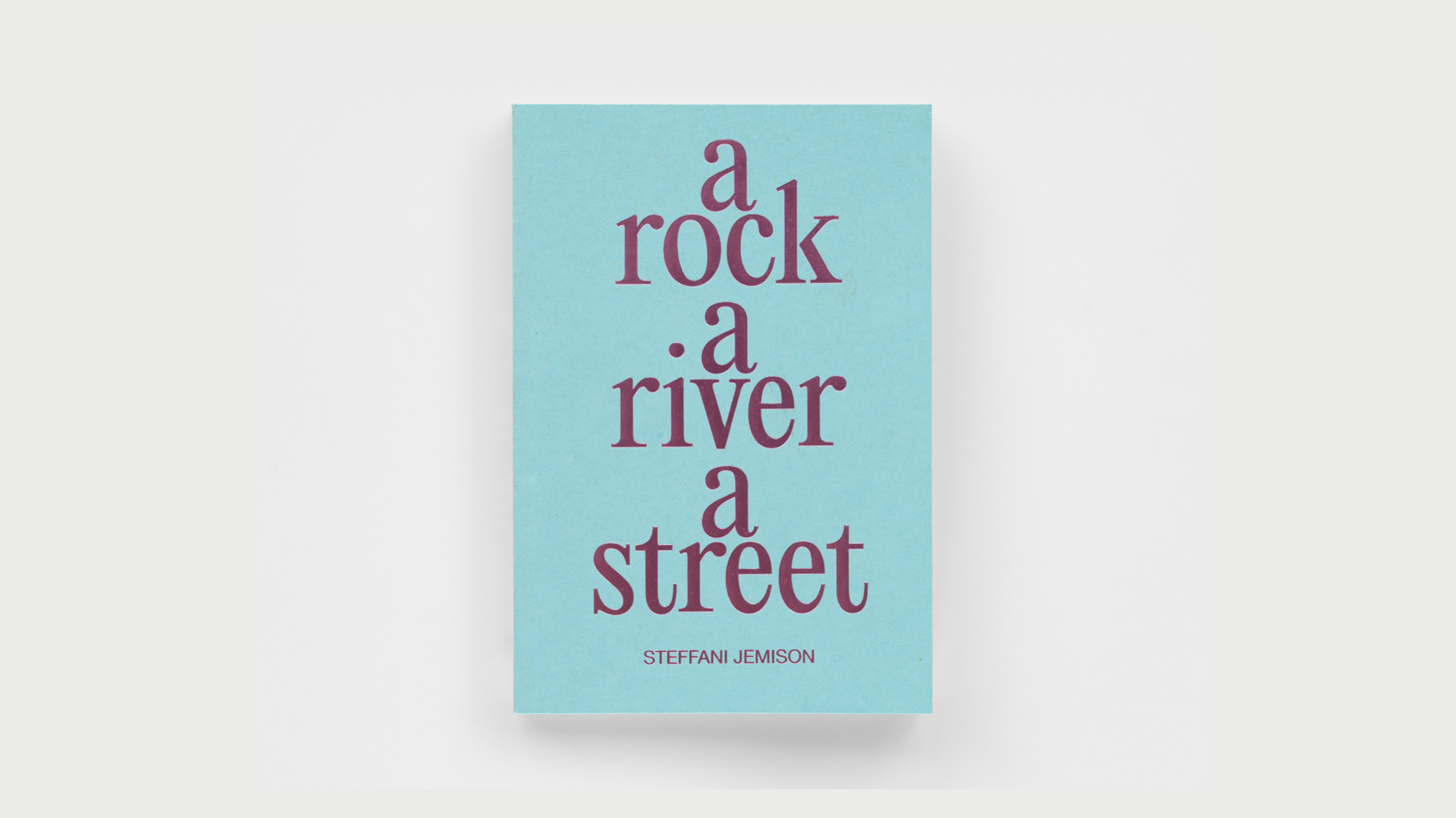 Light blue book cover, with a metallic purple title that reads "a rock, a river, a street" in lowercase. Each word is stacked on top of the other. The author's name, Steffani Jemison, sits below the title in all capital letters.