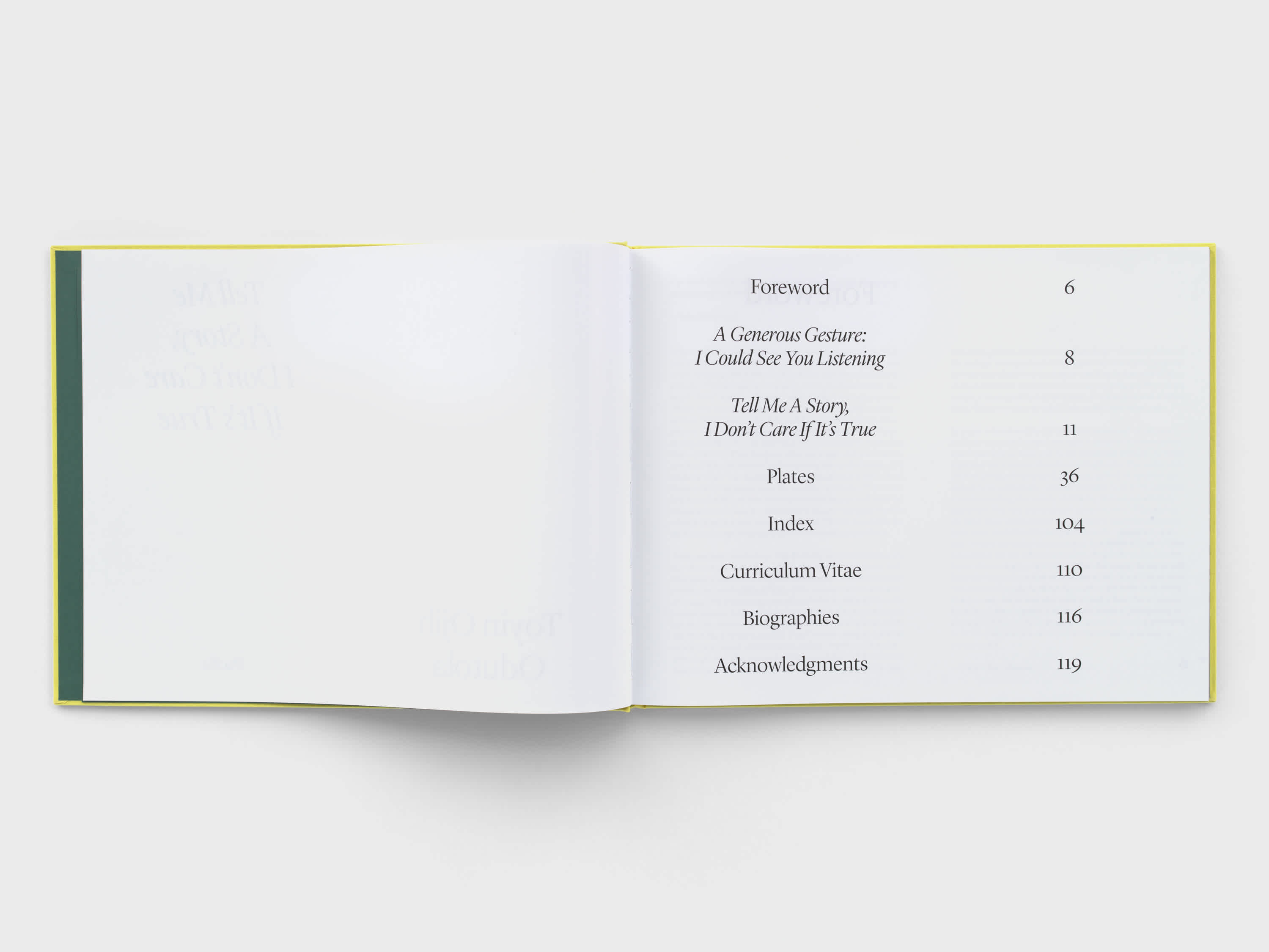 Open book with a table of contents on the right page. The left page is blank.