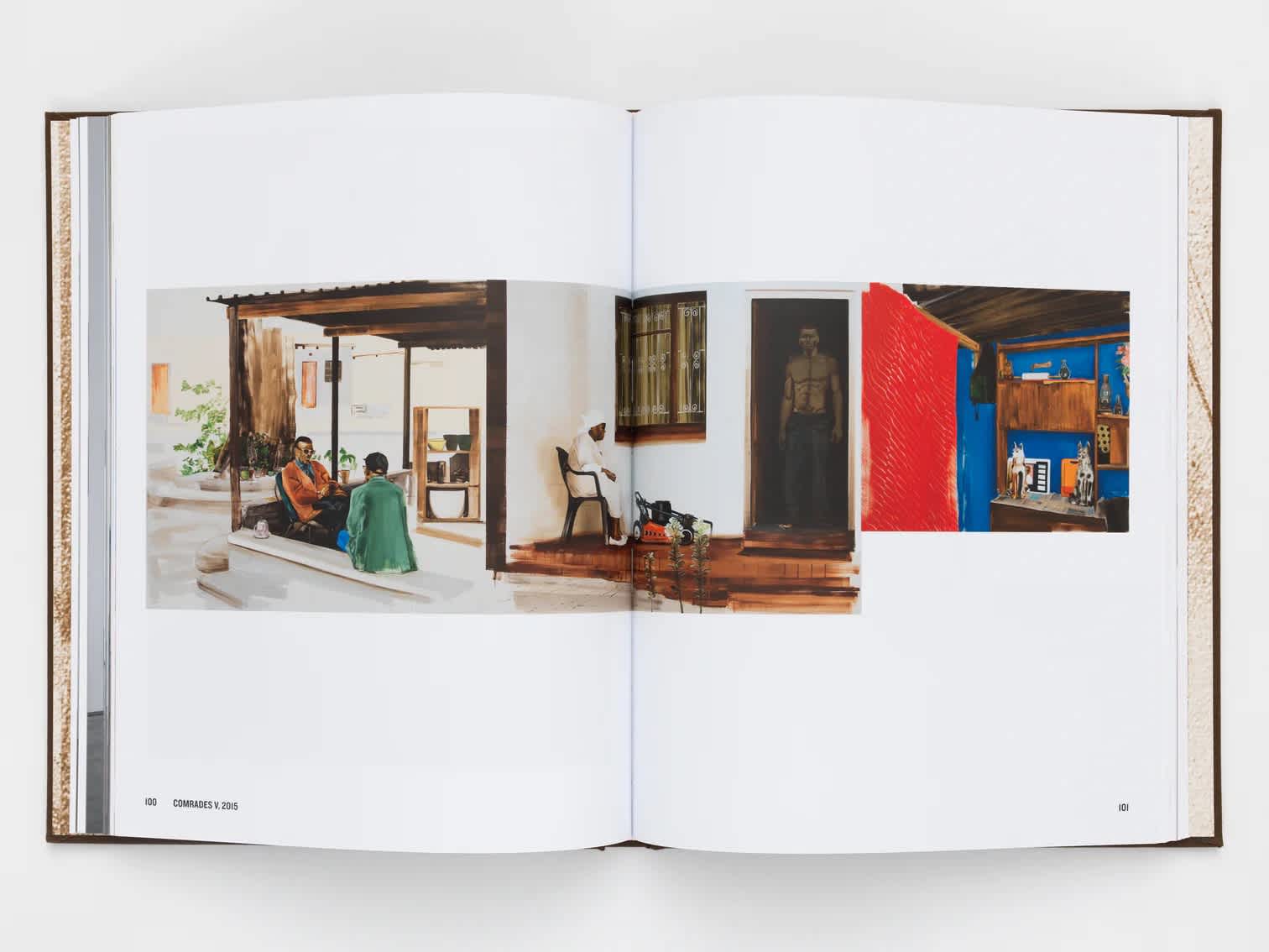 Open book with a painting stretching across both pages.