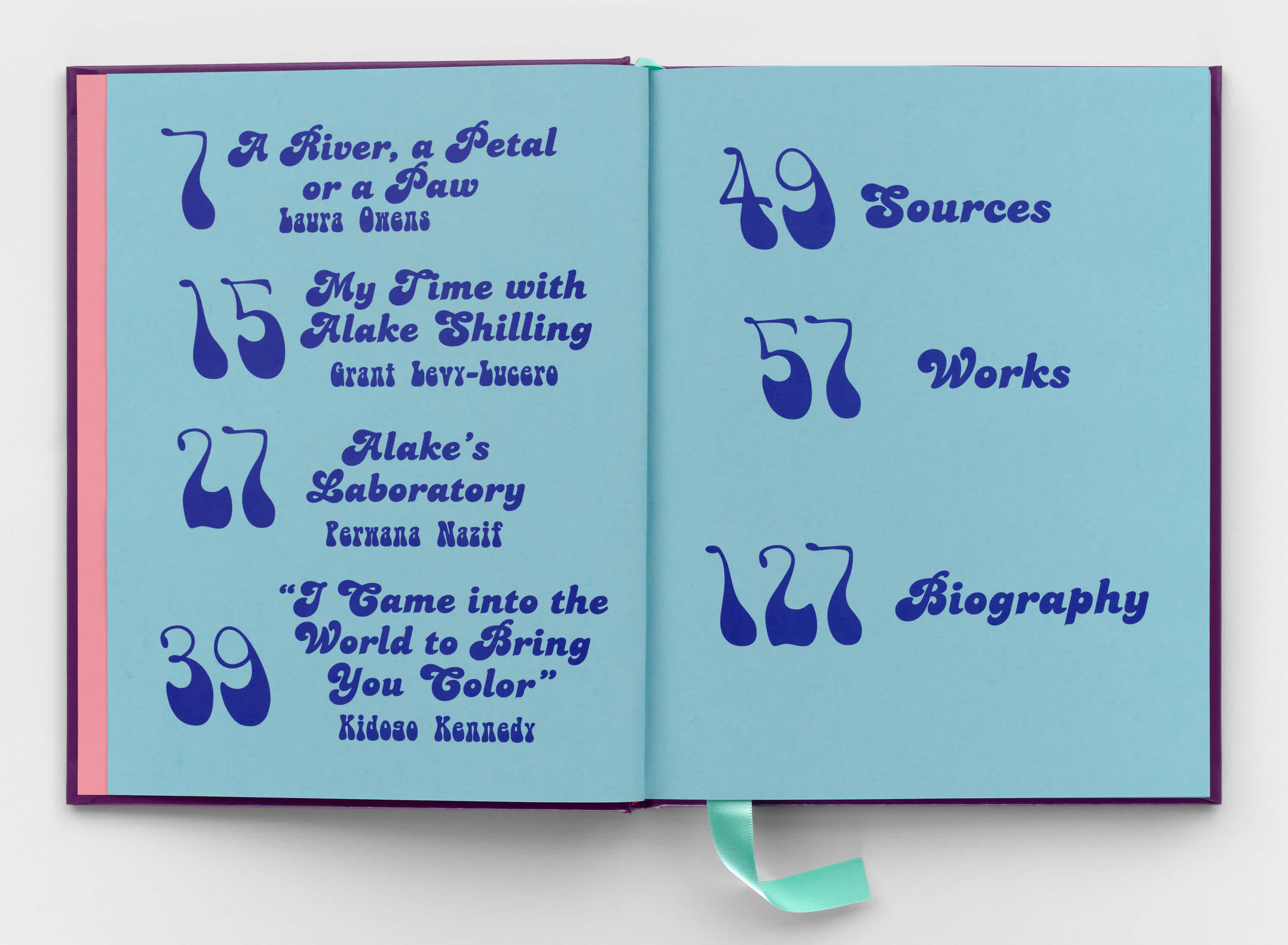 A book rests on a white background. It is opened to the table of contents page. The paper is light blue and the numbers and chapter titles are royal blue. The lettering is a soft, curly, psychedelic font.