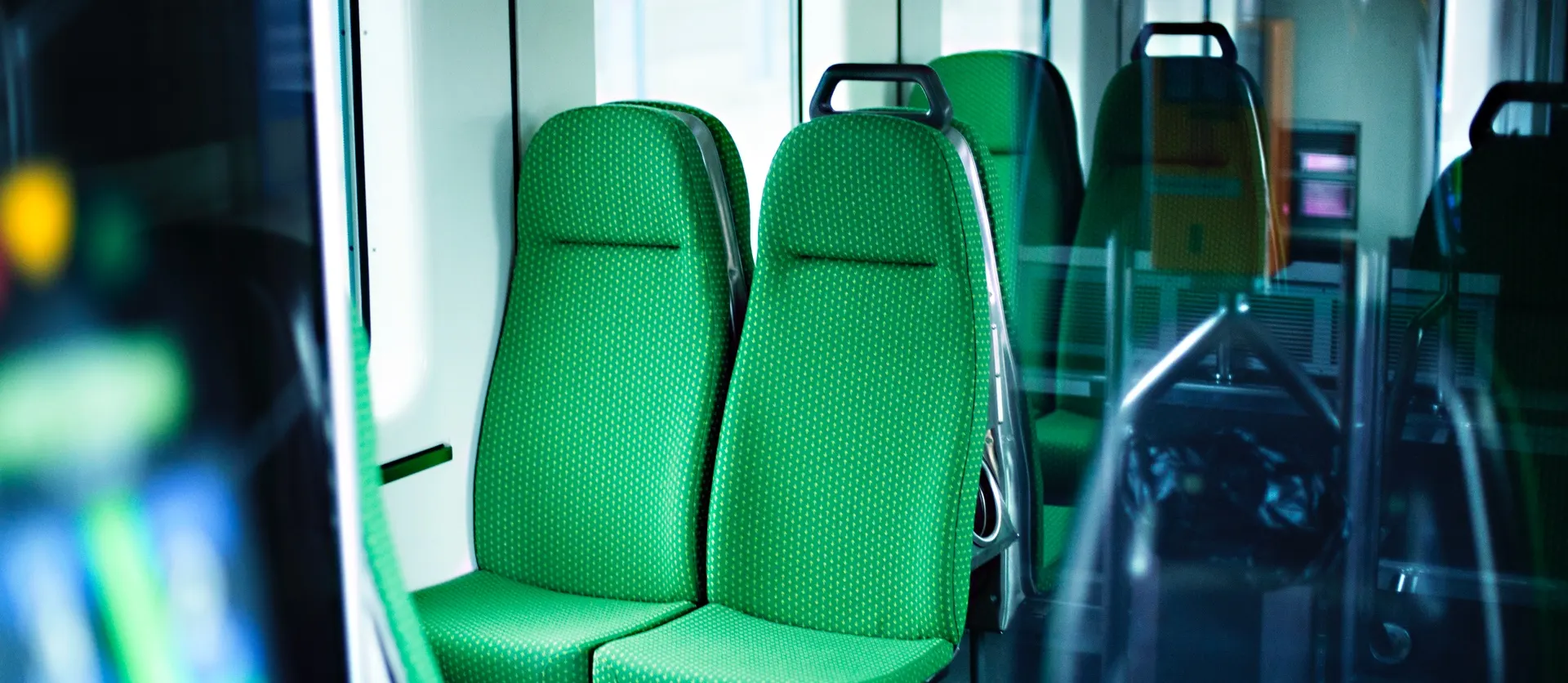 On board many commuter trains there are two seats on either side of the centre aisle.