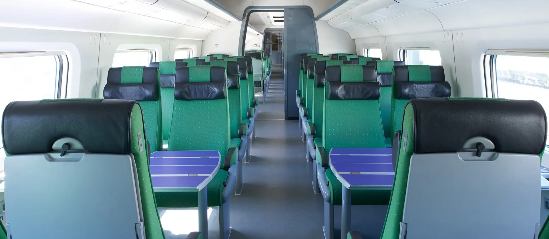 On board Pendolino trains, there are two adjacent seats on both sides of the centre aisle. The trains also have seating with tables for four people.