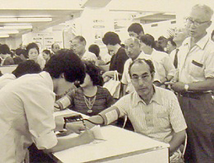 Shoppers at Daimaru Department Storein Kyoto stop to check their blood pressure