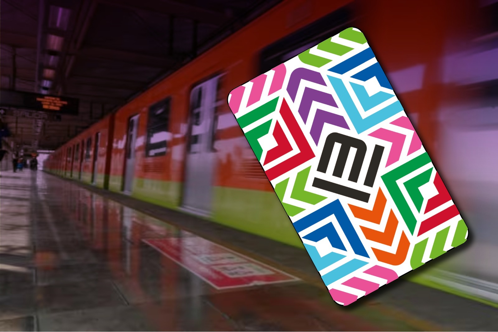 Tarjeta incluyente del Metro, al fondo un vagón del Metro de la CDMX.