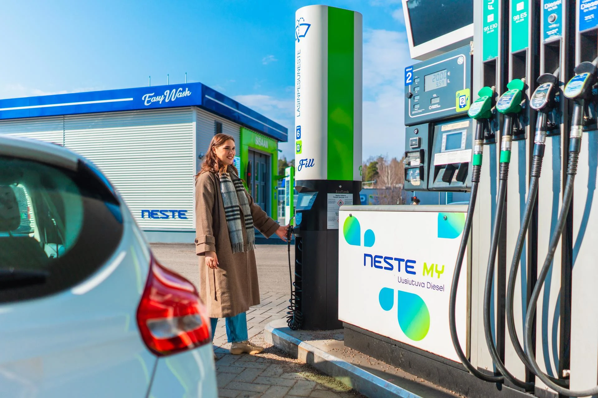 A customer at a neste fuel station