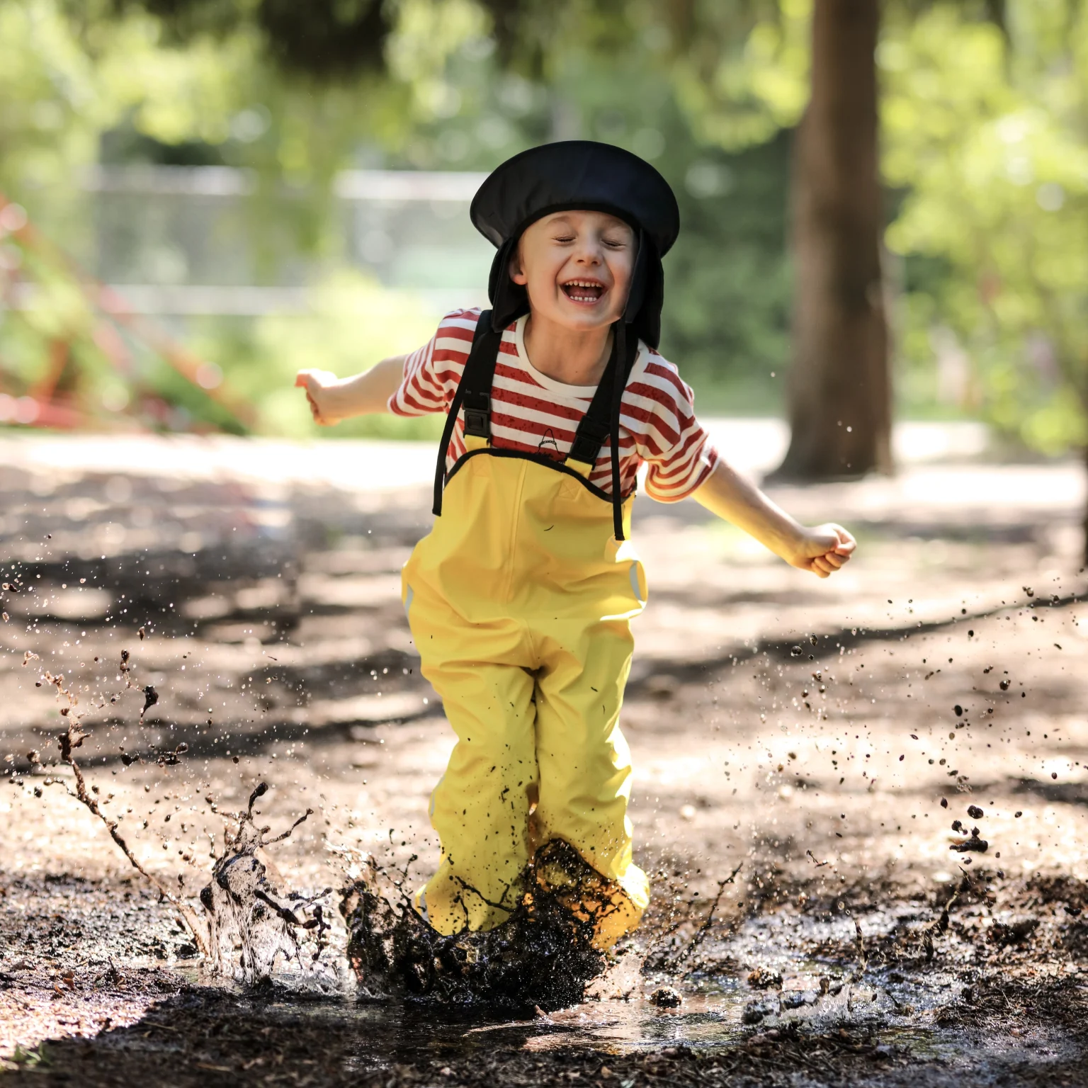 sustainability-summer-kid-jumping-in-puddle-1080x1080