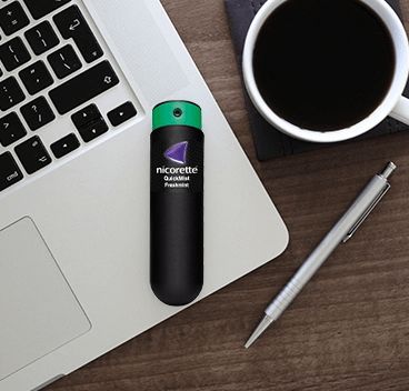 Nicorette QuickMist, computer og kaffekop