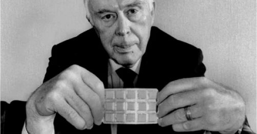 Man holding a packet of gum