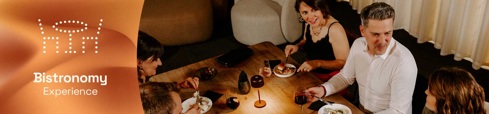 Bistronomy Experience banner with logo and photo of guests dining together at a set table