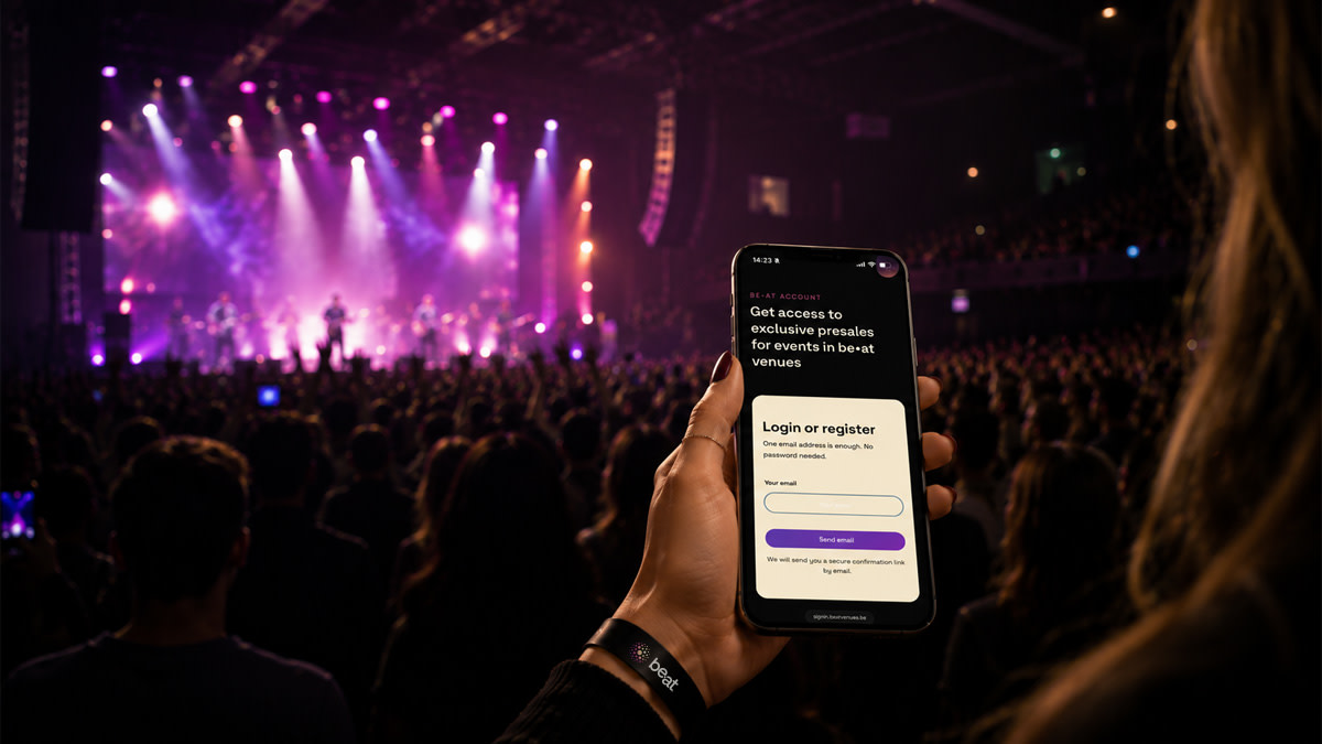 Concertgoer uses the be•at Account on a smartphone to access exclusive presales during a live concert.
