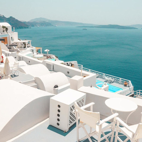A villa abroad perches on a cliff with a swimming pool