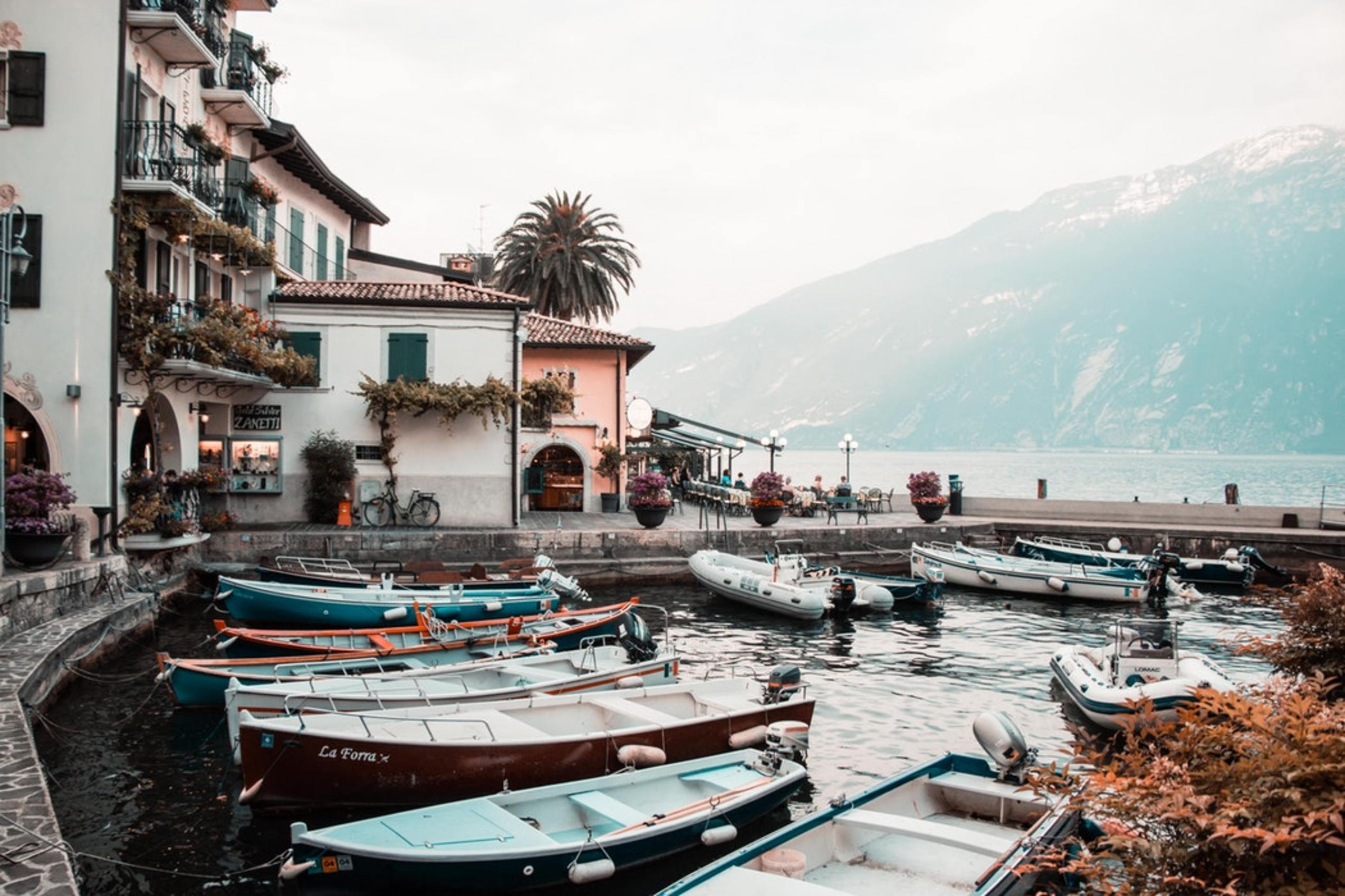 Boats and villas by Lake Garda in Italy