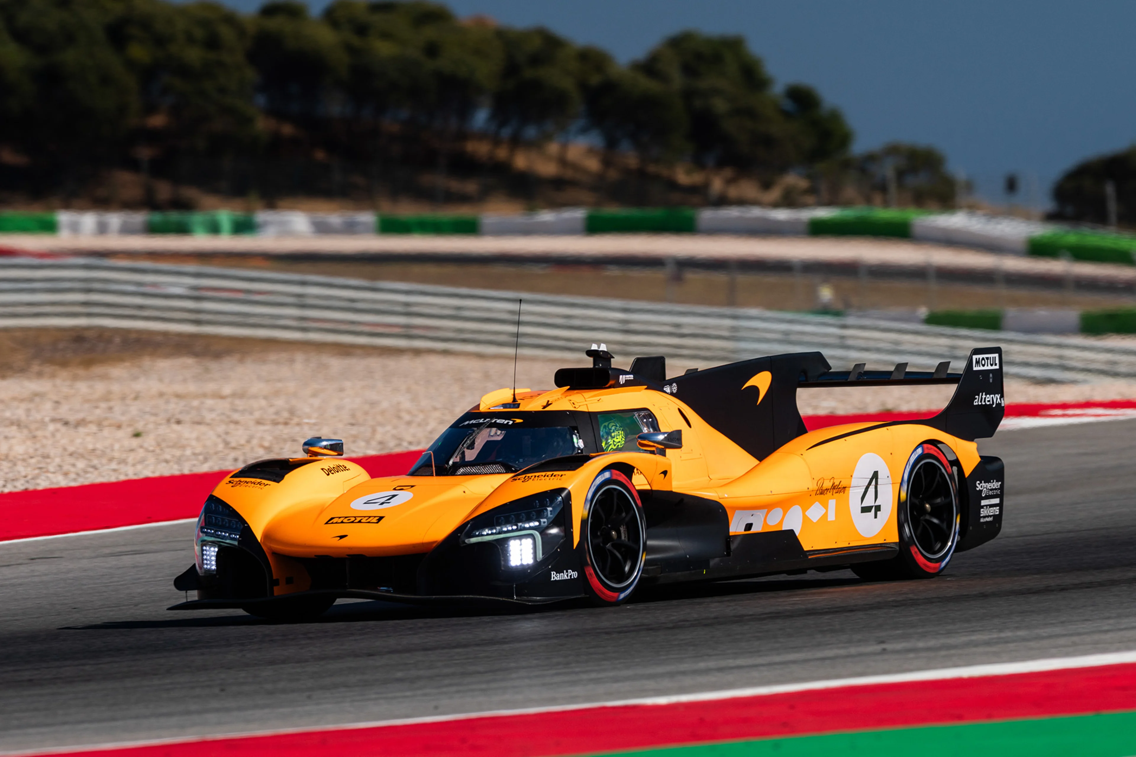 Lando Norris on track driving the McLaren MCL-HY in Portimão