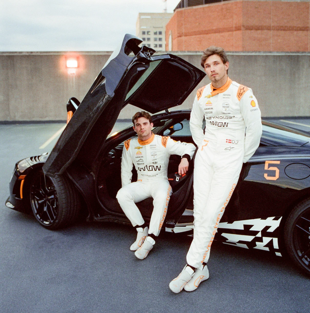 Indycar - 2025 - Arrow-mclaren-unveils-indianapolis-500-firesuits - "Never Stop Racing" Firesuits for the Indianapolis 500 - 4