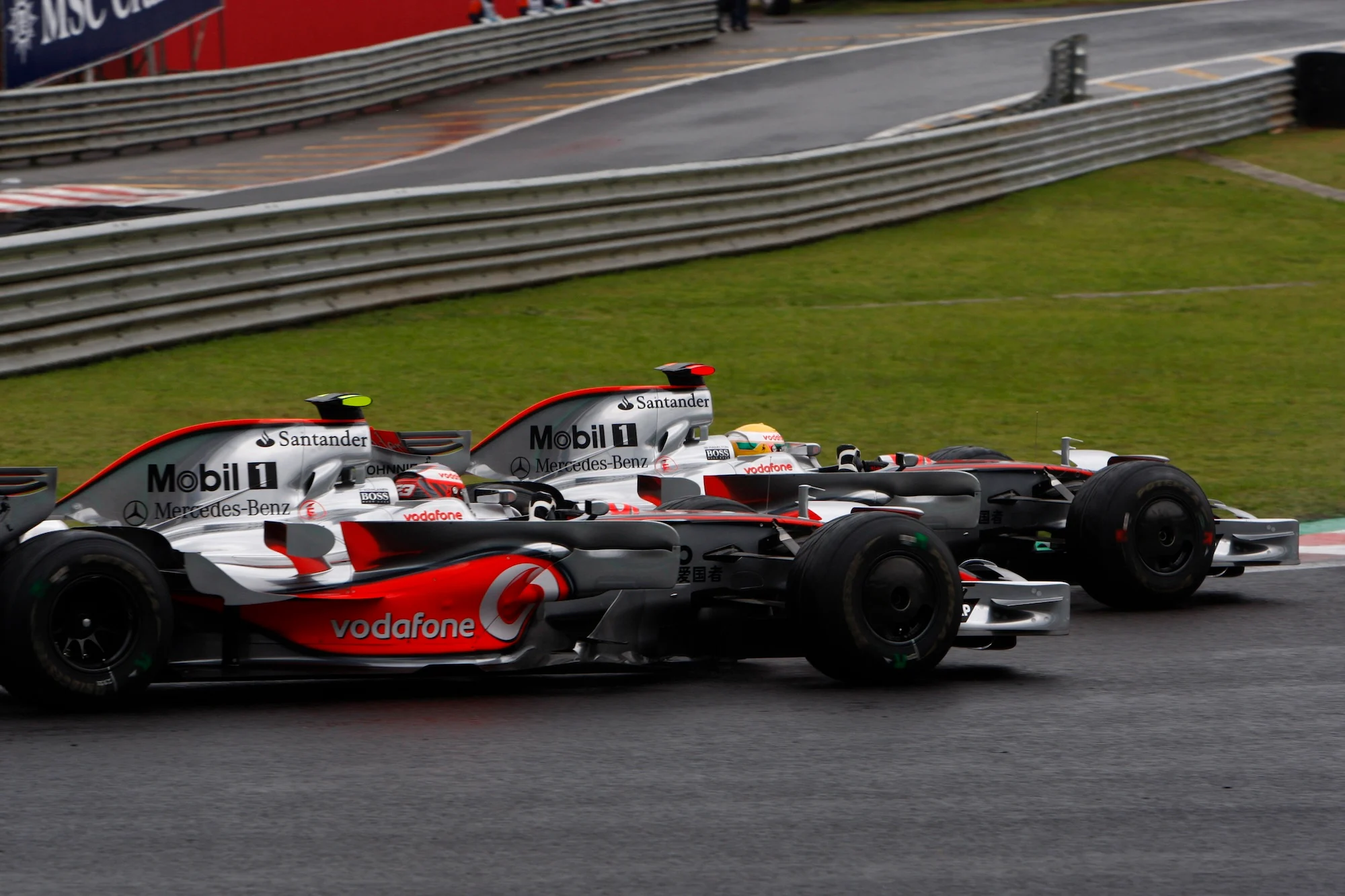 Lewis Hamilton and Heikki Kovalainen at the 2008 Sao Paulo grand prix in the MP4-23