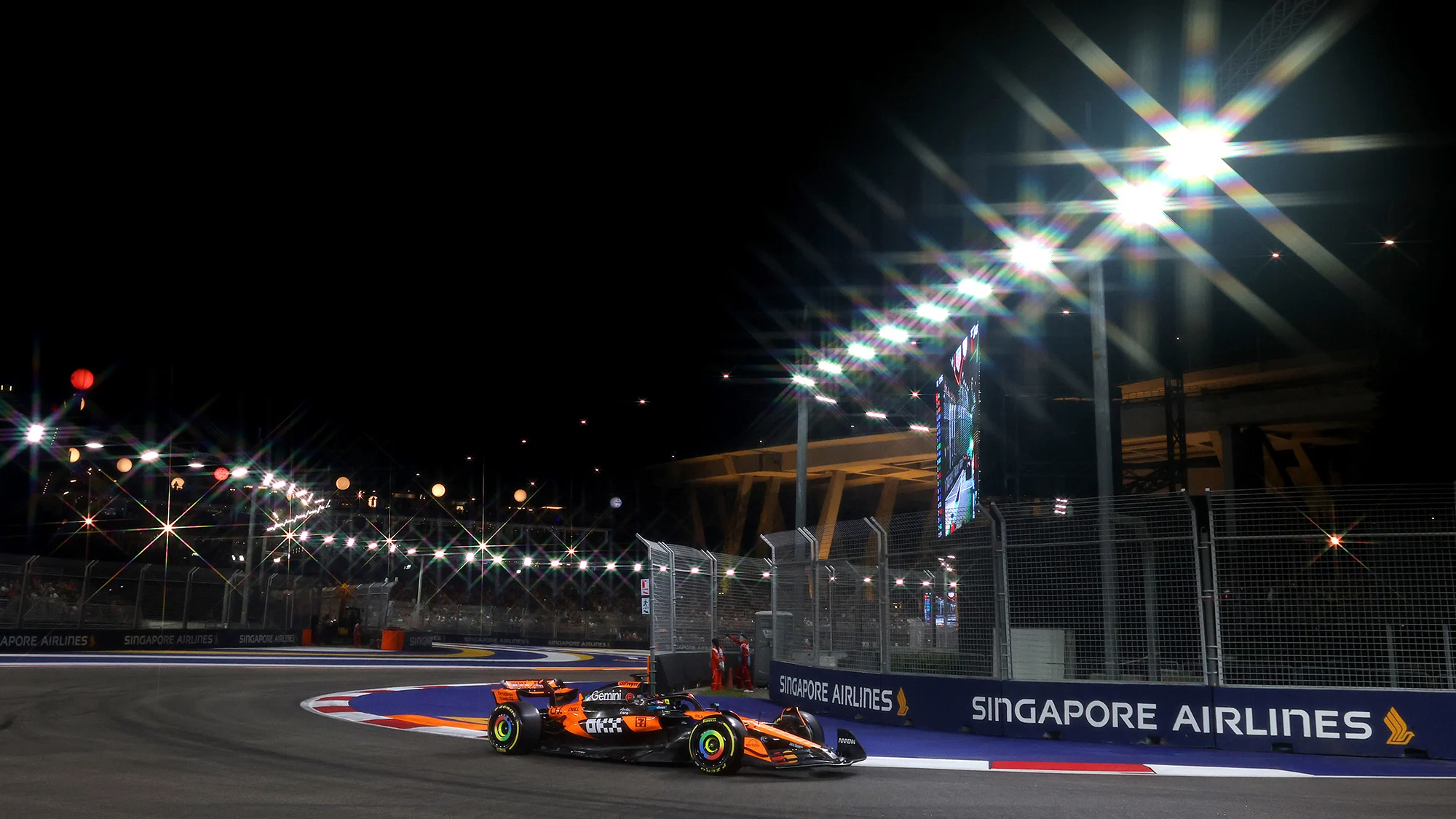 Oscar Piastri driving the McLaren MCL39 on track during practice ahead of the 2025 F1 Grand Prix of Singapore at Marina Bay Street Circuit
