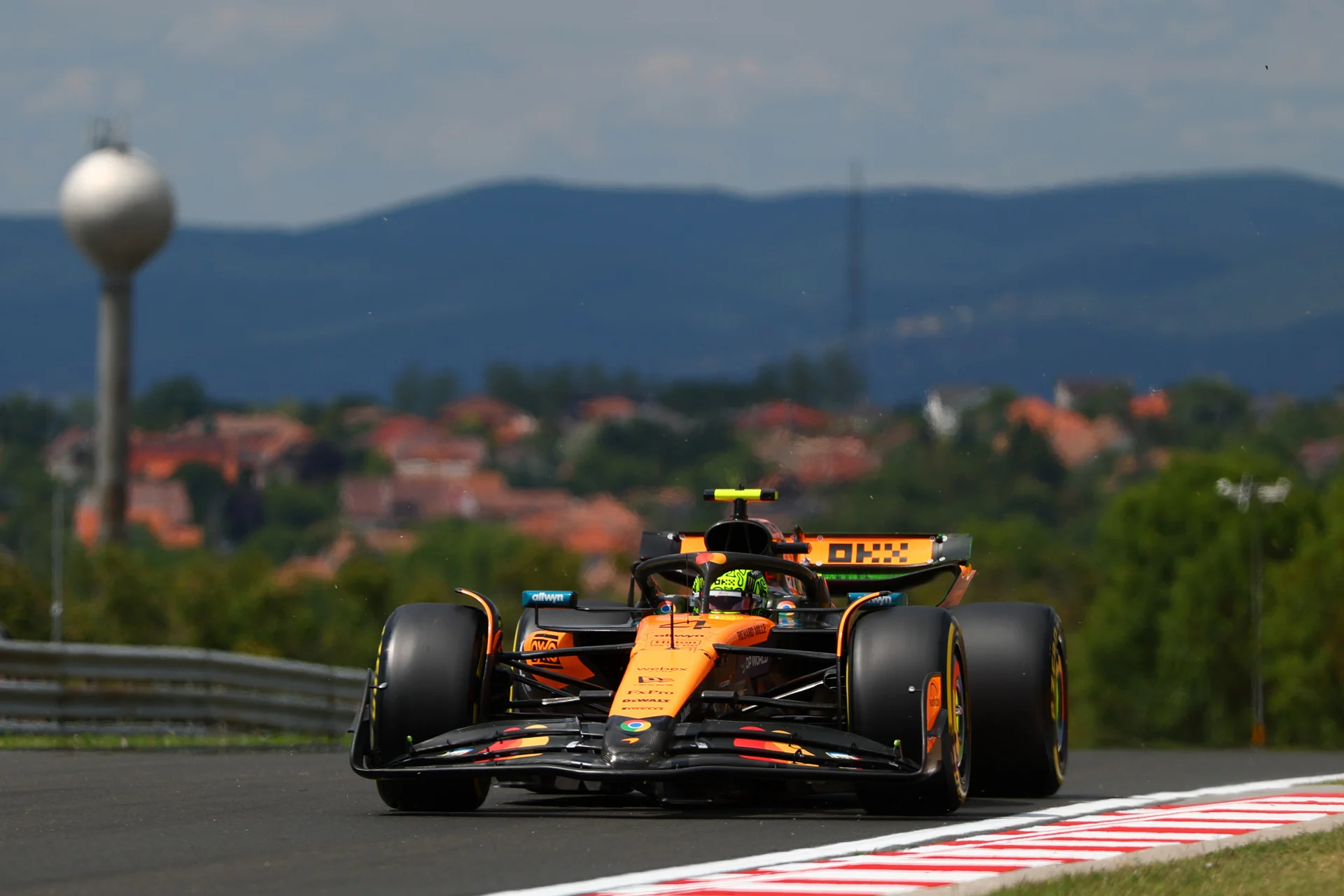Lando Norris and Oscar Piastri celebrating their 1-2 finish in Hungary 2025