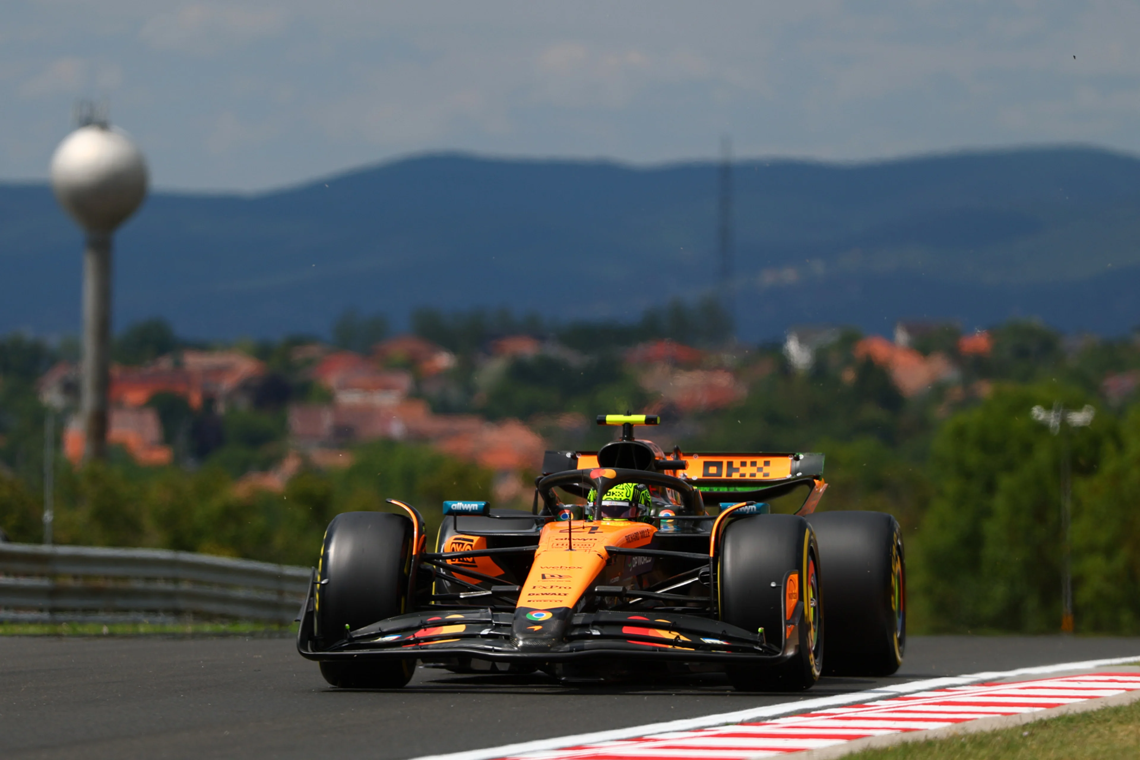 Lando Norris and Oscar Piastri celebrating their 1-2 finish in Hungary 2025