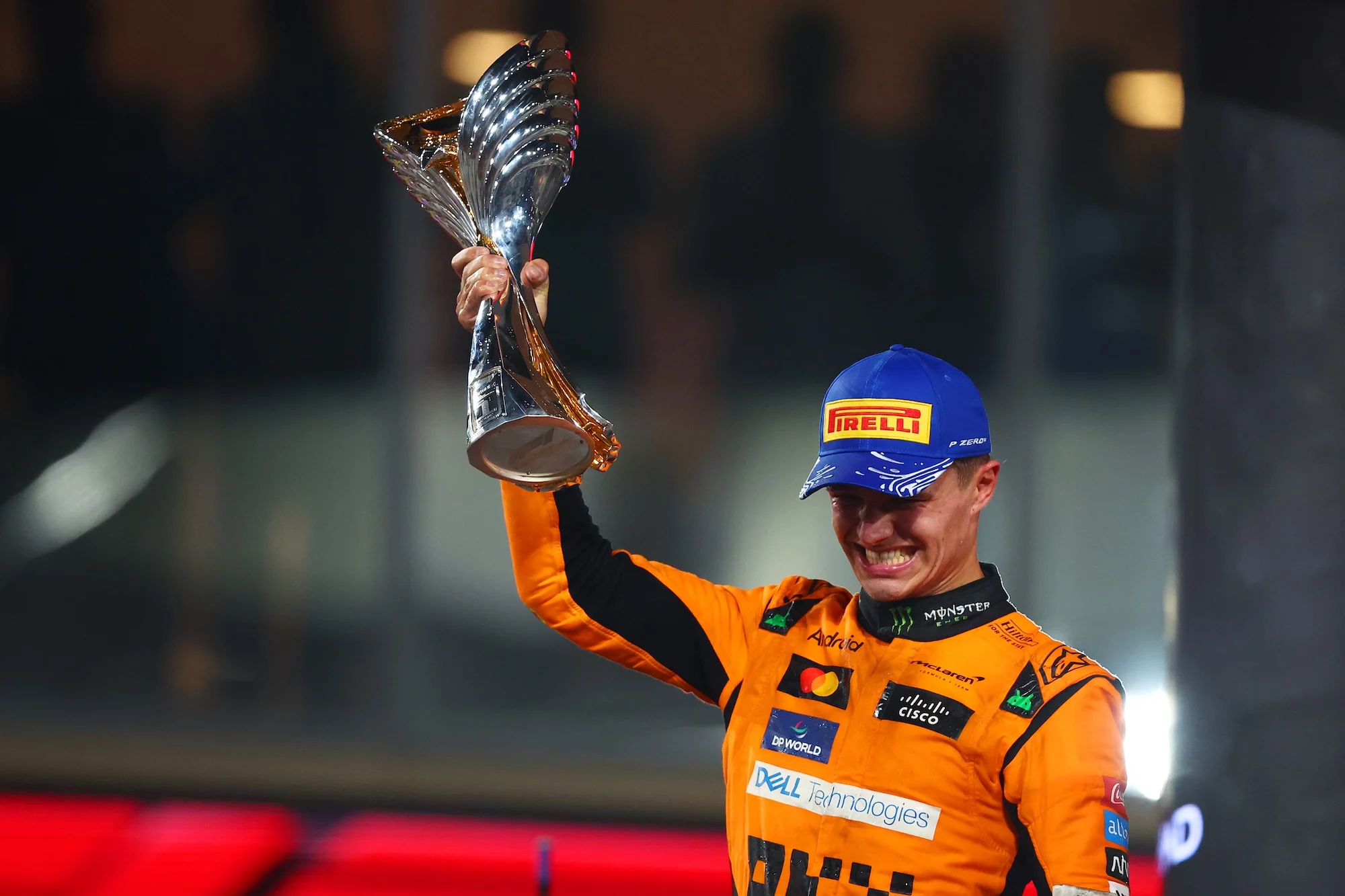 Lando Norris and McLaren celebrates on the podium during the Abu Dhabi  grand prix at Yas Marina Circuit