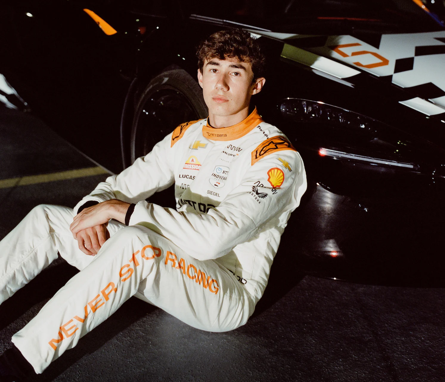 Indycar - 2025 - Arrow-mclaren-unveils-indianapolis-500-firesuits - "Never Stop Racing" Firesuits for the Indianapolis 500 - 7