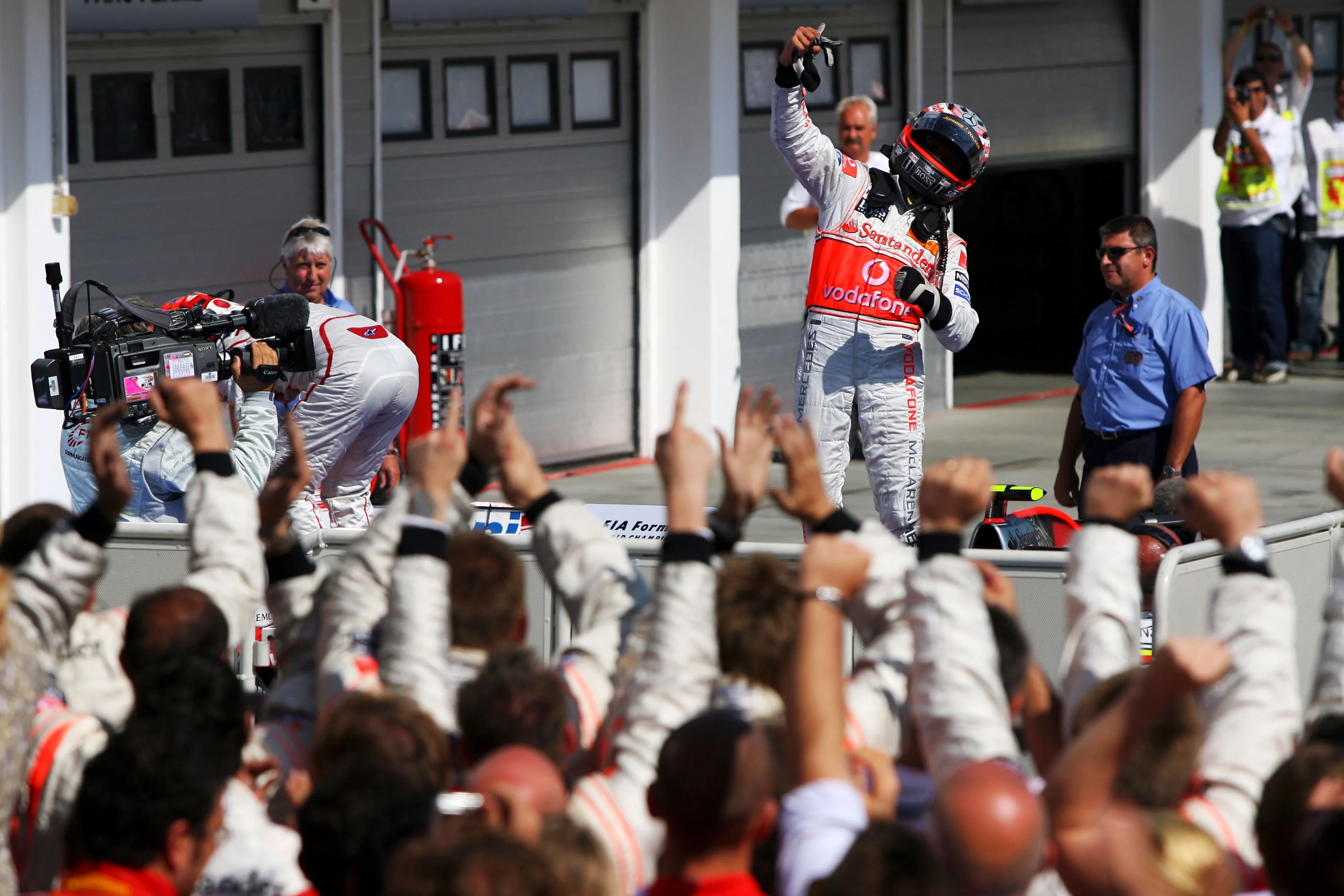 Race winner Heikki Kovalainen celebrates in parc ferme. Hungarian Grand Prix 2008.