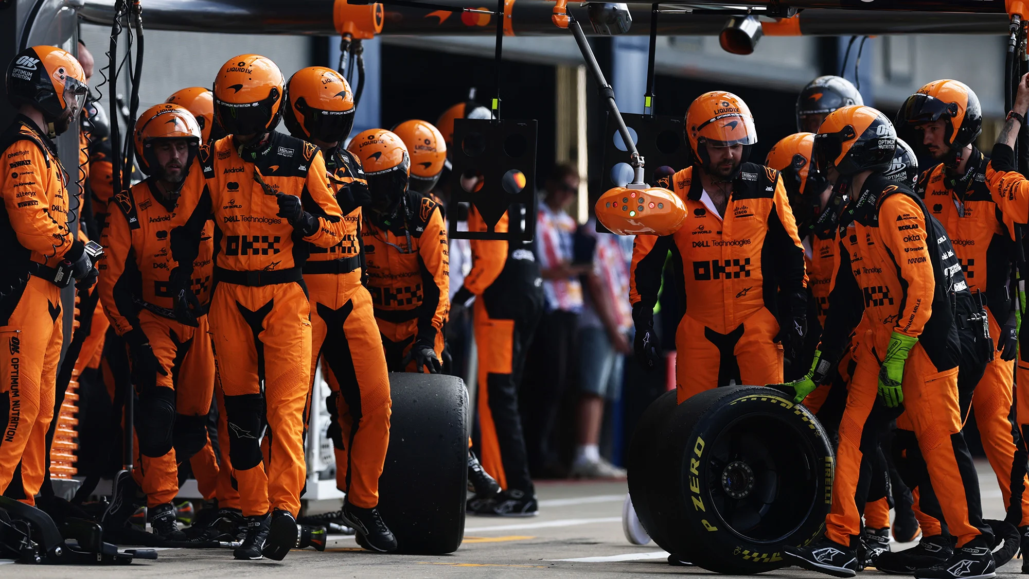 The McLaren pit crew ready for a stop during the F1 Grand Prix of Great Britain at Silverstone Circuit on July 05, 2026 in Northampton, England. 