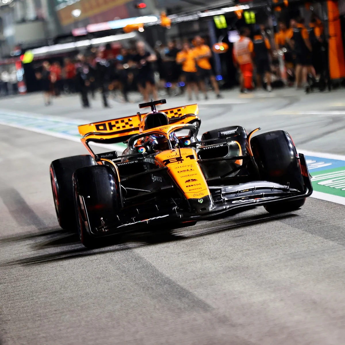 Read the McLaren Formula 1 qualifying report from the 2023 Singapore Grand Prix.