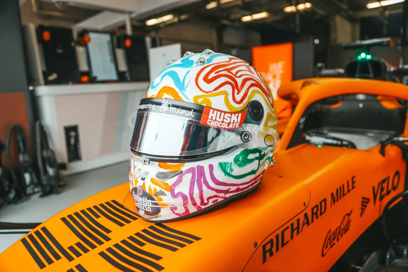 Love these lids Carlos and Lando to show their support of World Mental Health Day on track - 1