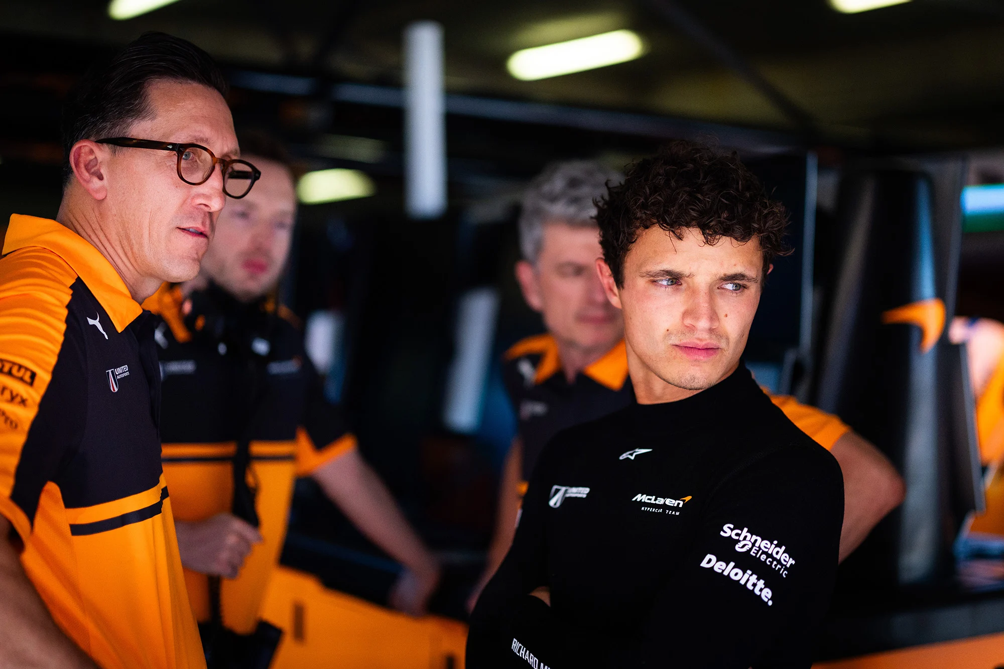 James Barclay and Lando Norris in the McLaren Endurance garage in Portimão