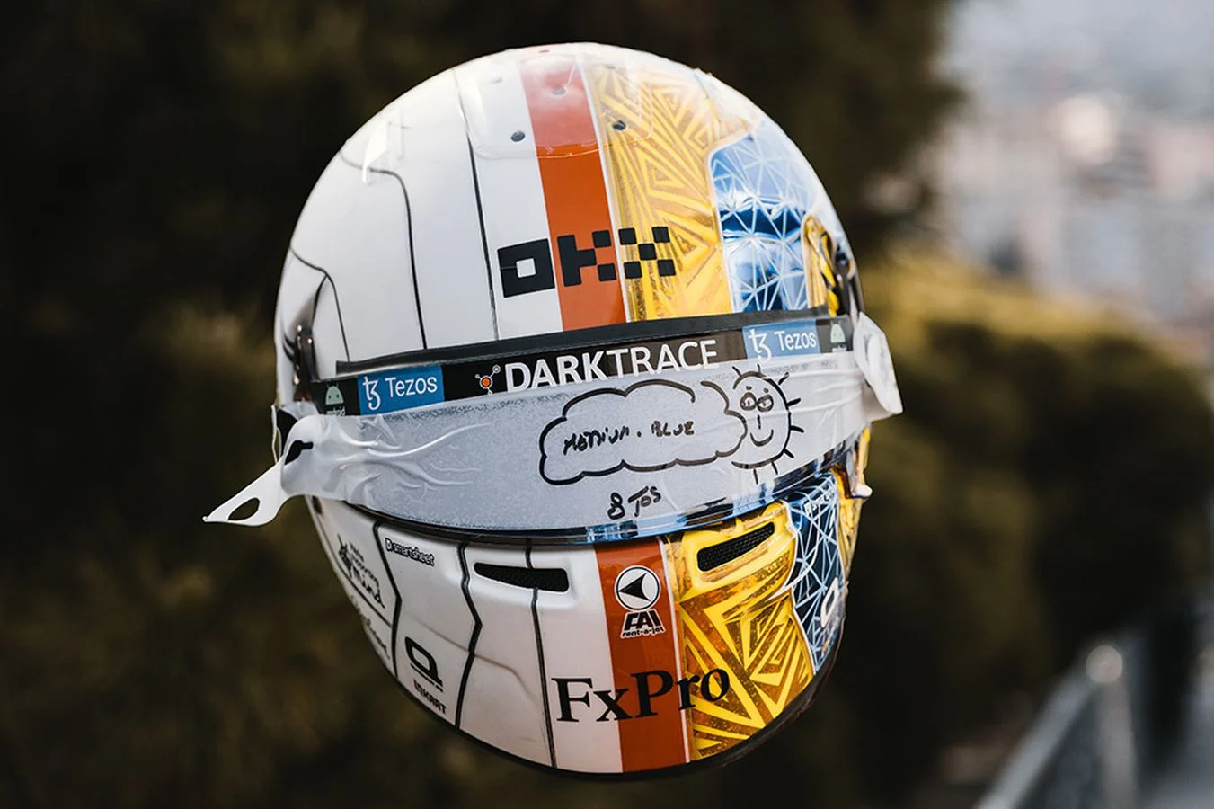 Latest-news - Mclarenracing - Article - Winter-mclaren-2022-lando-lids - Lando's 2022 helmet collection From throwbacks, to crossovers and collaborations, Lando's designs didn't disappoint - 4