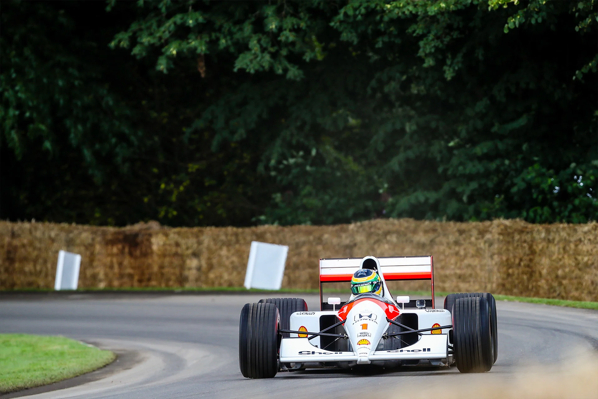 Formula-1 - 2025 - Mclaren-racing-announces-2025-goodwood-festival-of-speed-line-up - Going up the hill at Goodwood - 1