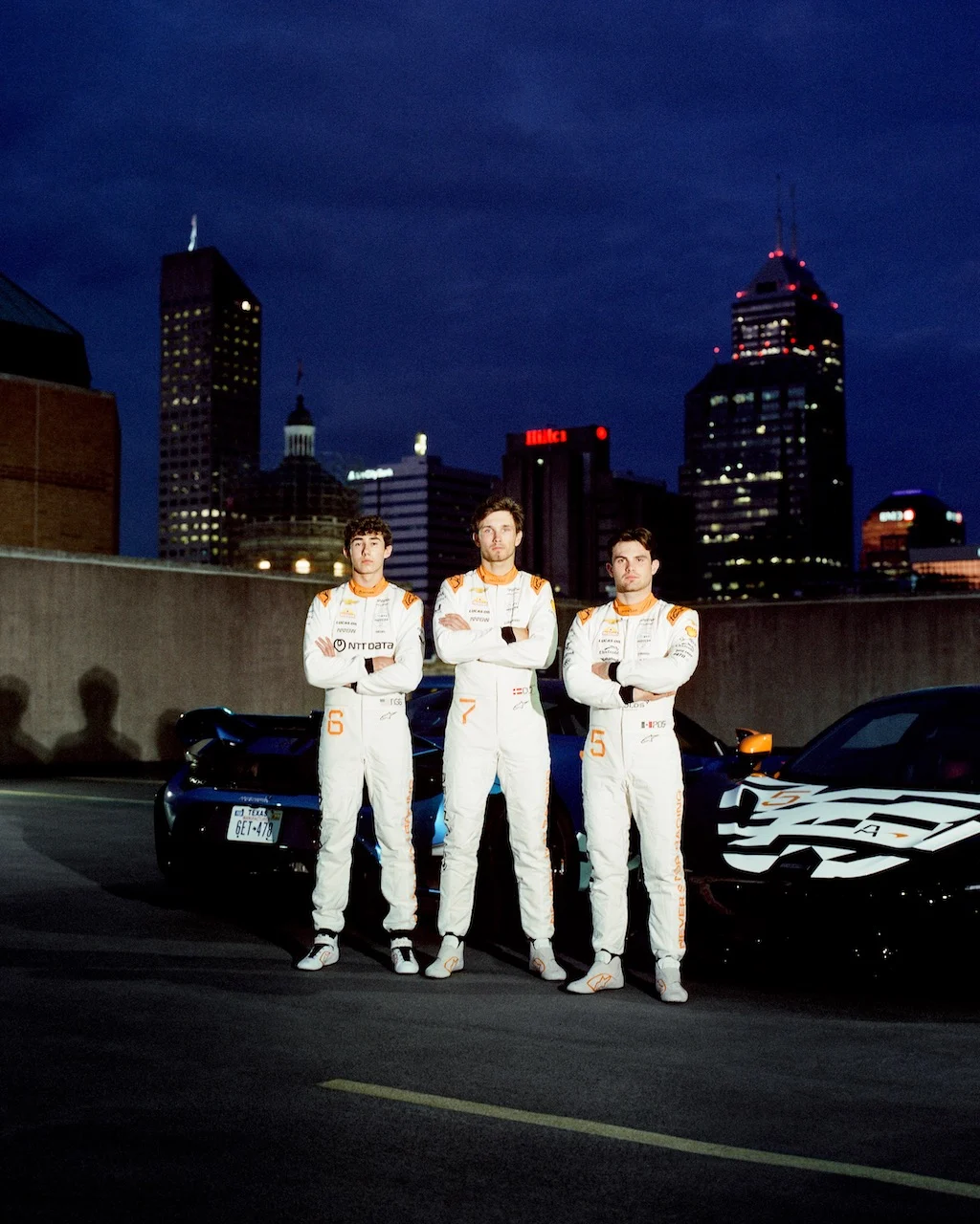 Indycar - 2025 - Arrow-mclaren-unveils-indianapolis-500-firesuits - "Never Stop Racing" Firesuits for the Indianapolis 500 - 0