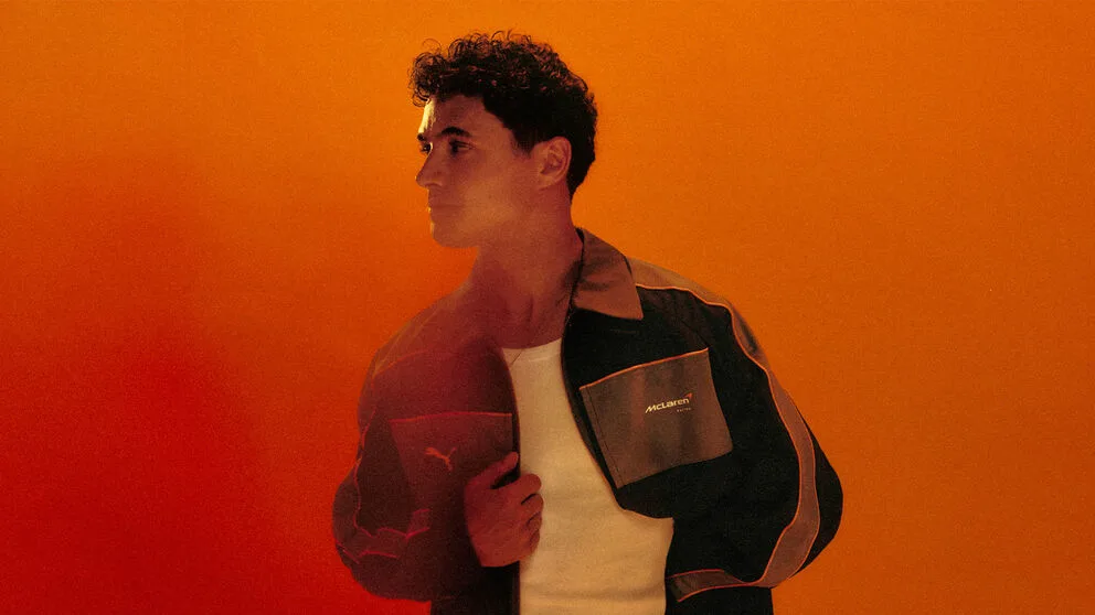 Lando sports the new McLaren Racing fanwear by Puma