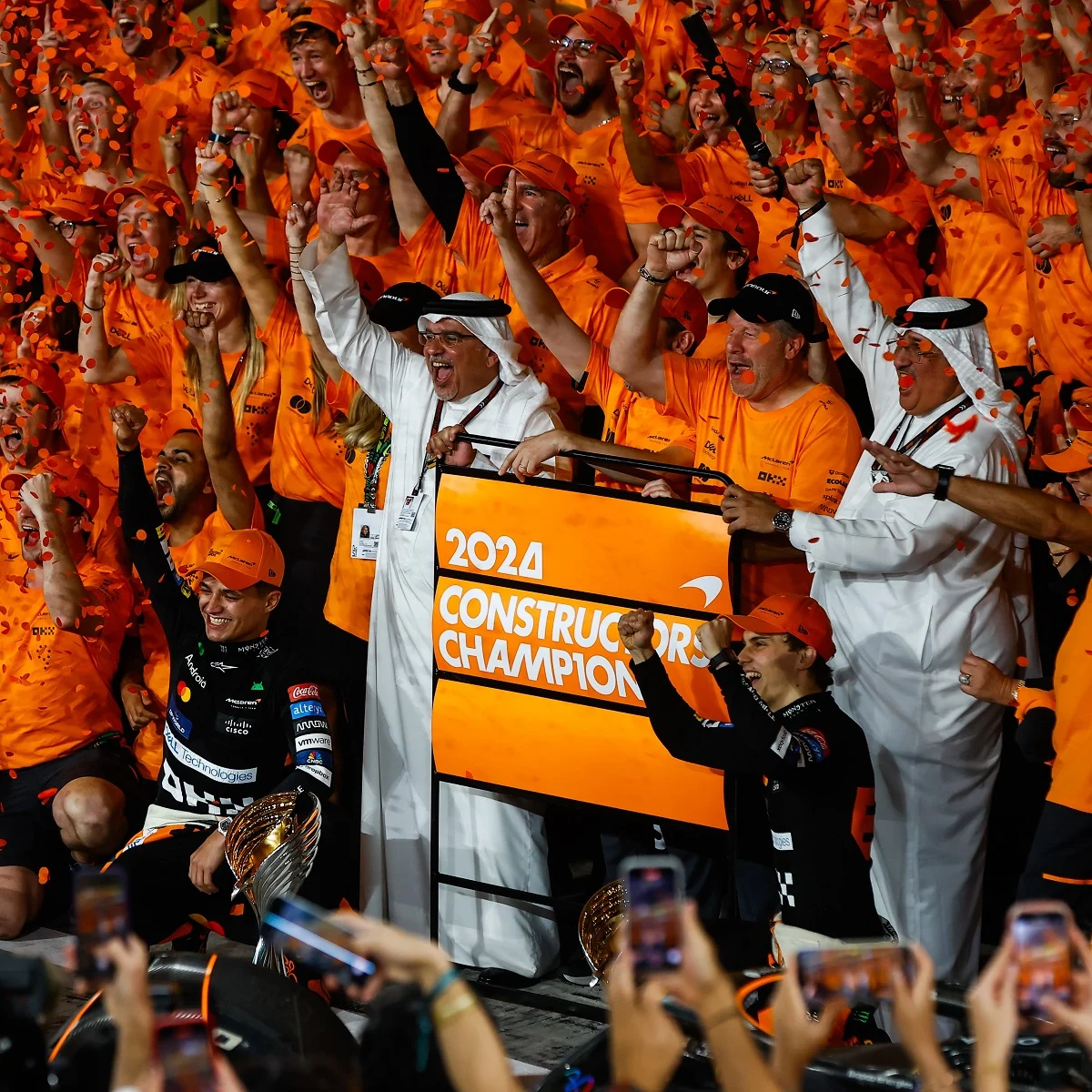 Lando, Oscar, CEO Zak Brown and Team Principal Andrea Stella react to McLaren’s Constructors’ Championship win