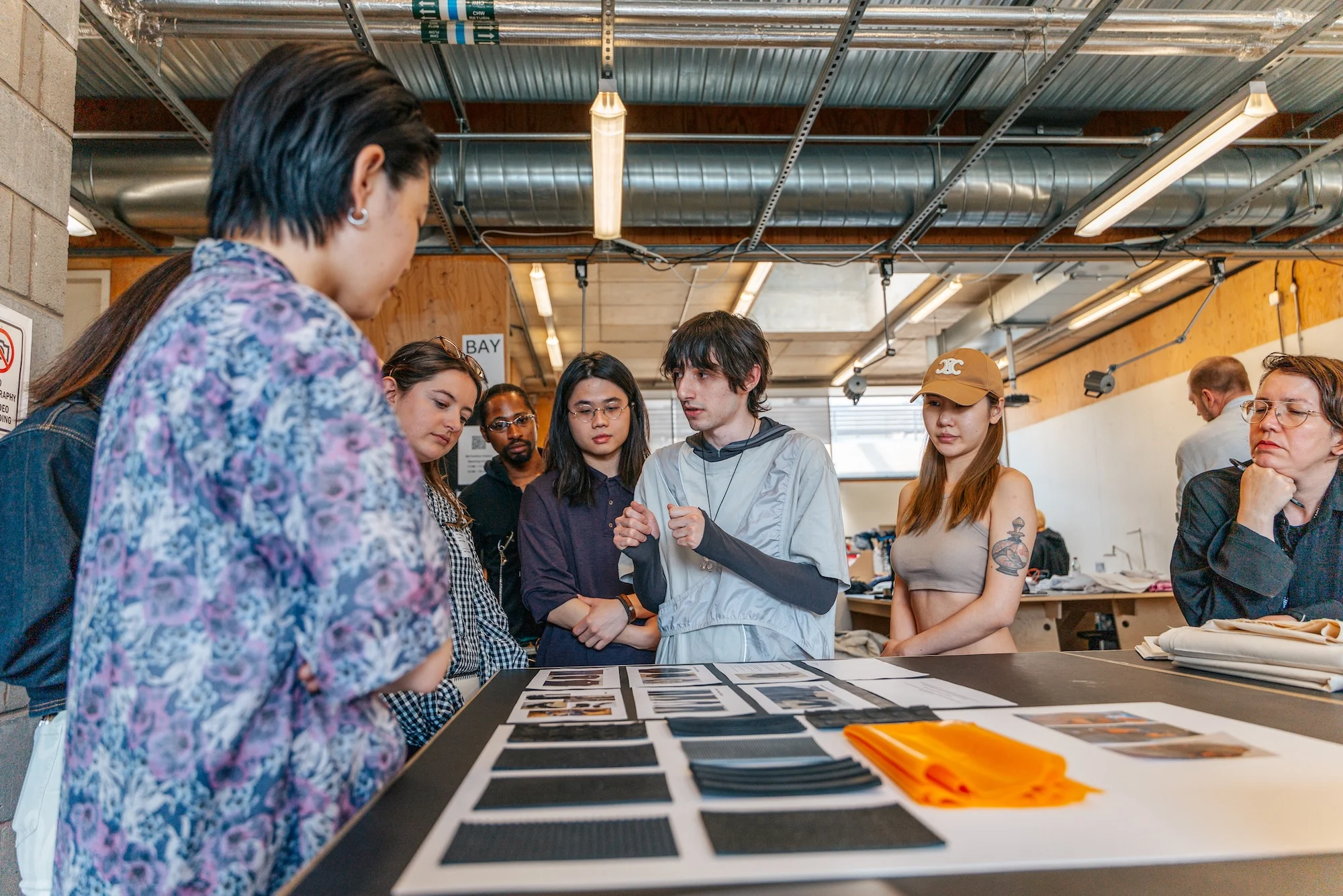 McLaren Racing and Central Saint Martins students planning the designed to race fashion show campaign