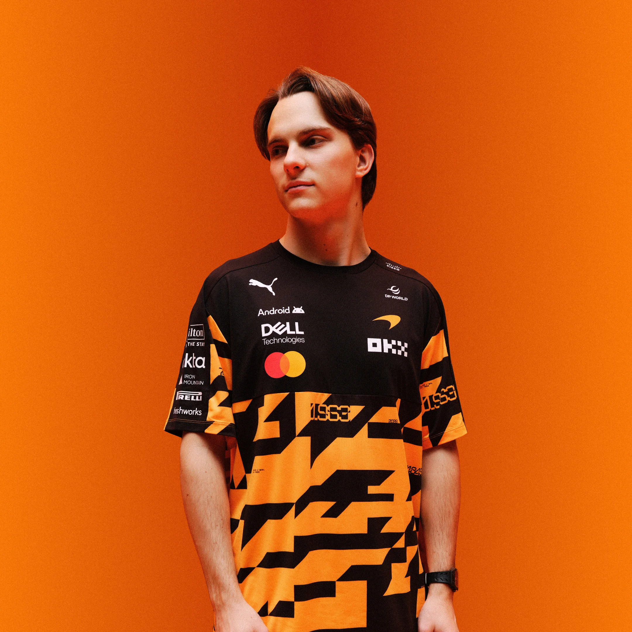 Win a signed 1000th Grand Prix T-shirt